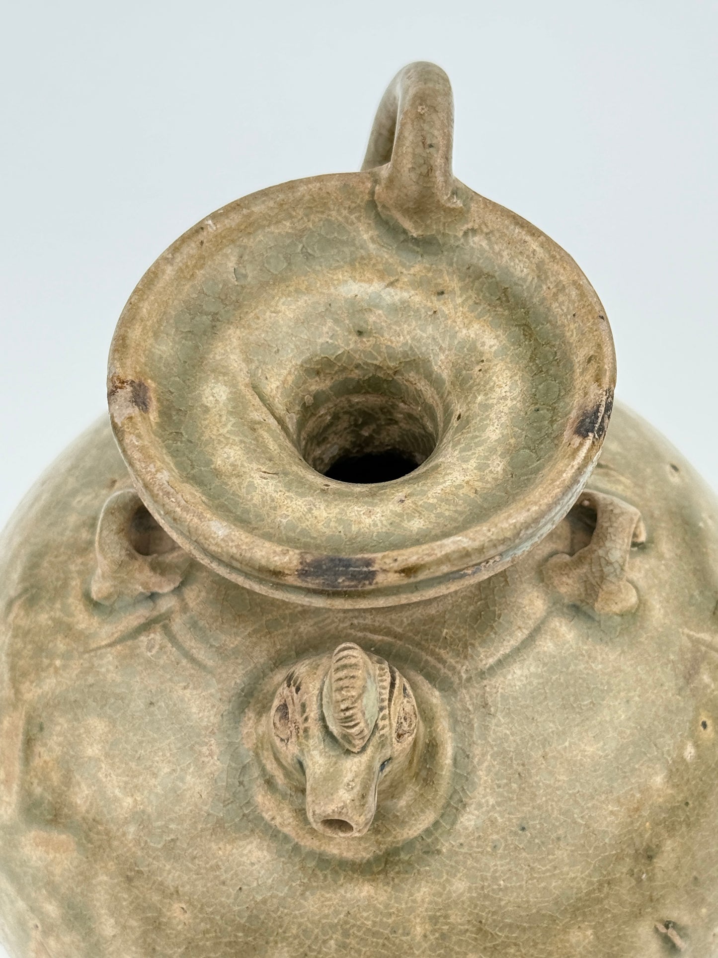 A RARE YUE CELADON CHICKEN-HEAD EWER, JIN-SOUTHERN DYNASTY