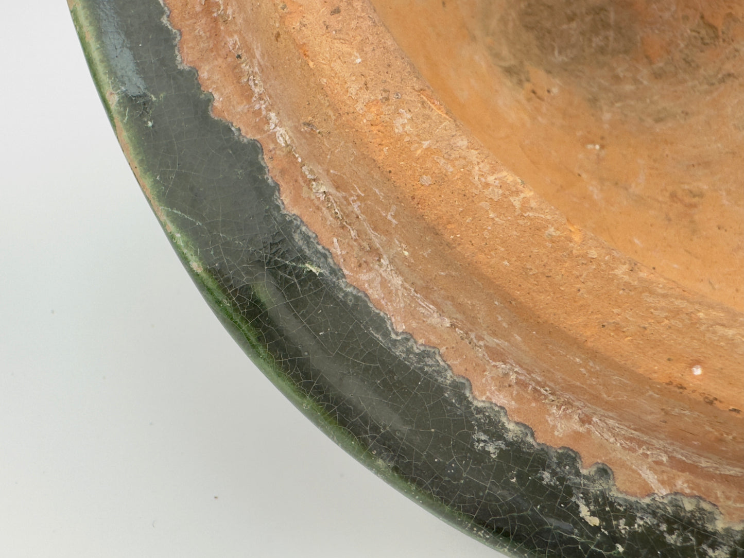 A GREEN-GLAZED POTTERY TRIPOD 'HILL' JAR, HAN DYNASTY, 206 BC - 220 AD