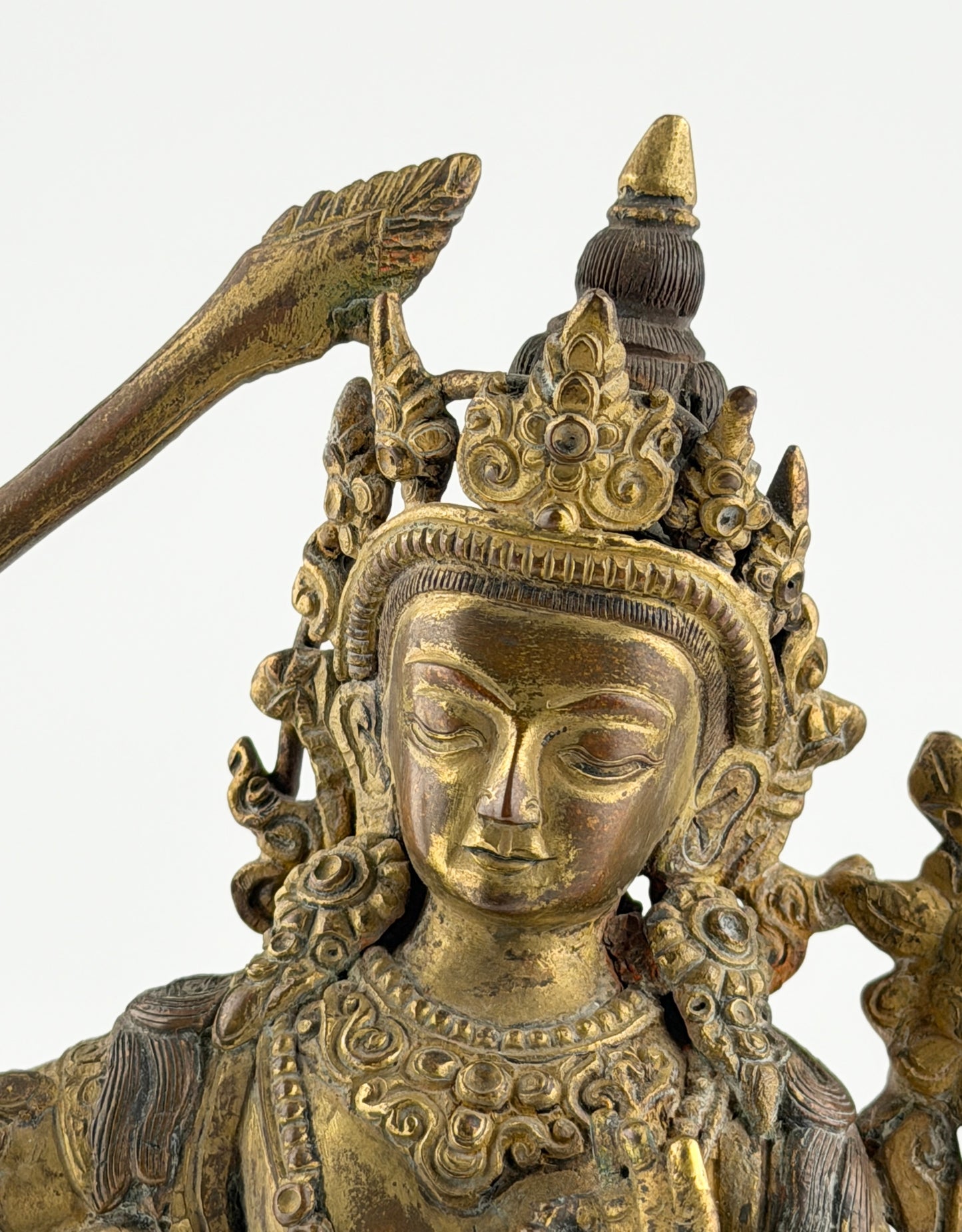 Gilt Bronze Figure of Manjusri Seated on a Lotus Base