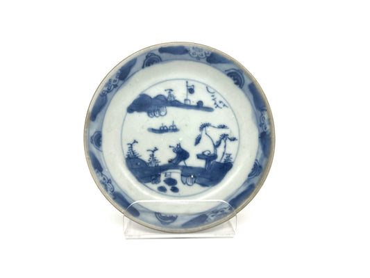 PASSING BOAT AND BRIDGE PATTERN BLUE AND WHITE TEABOWL AND SAUCER SET CIRCA 1725, QING DYNASTY, YONGZHENG ERA