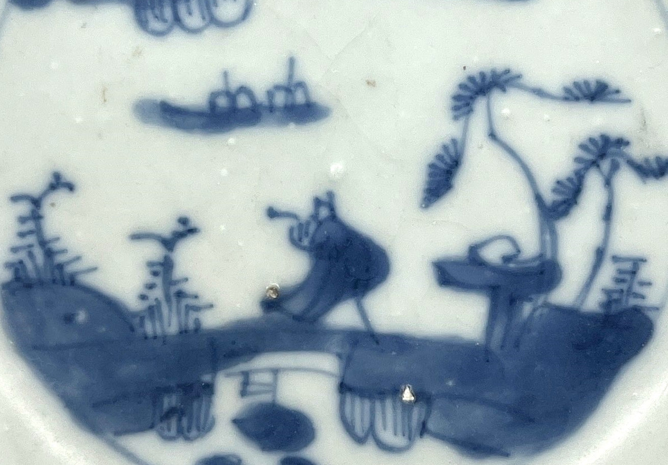 PASSING BOAT AND BRIDGE PATTERN BLUE AND WHITE TEABOWL AND SAUCER SET CIRCA 1725, QING DYNASTY, YONGZHENG ERA