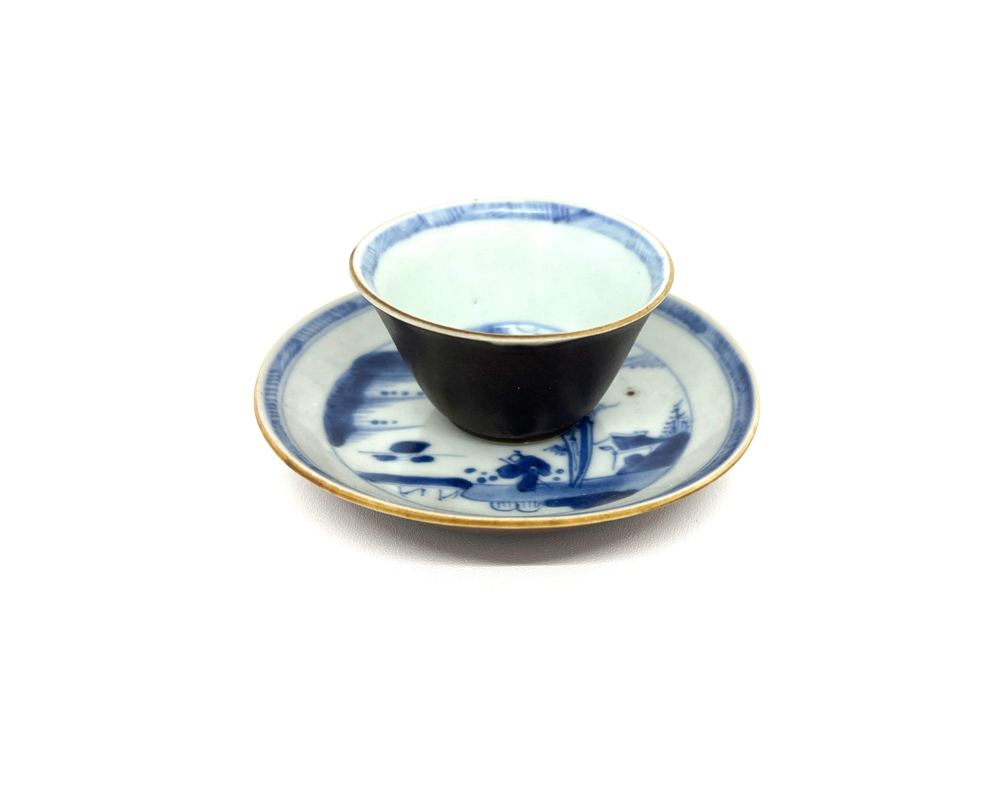 PASSING BOAT AND BRIDGE PATTERN BLUE AND WHITE TEABOWL AND SAUCER SET CIRCA 1725, QING DYNASTY, YONGZHENG ERA