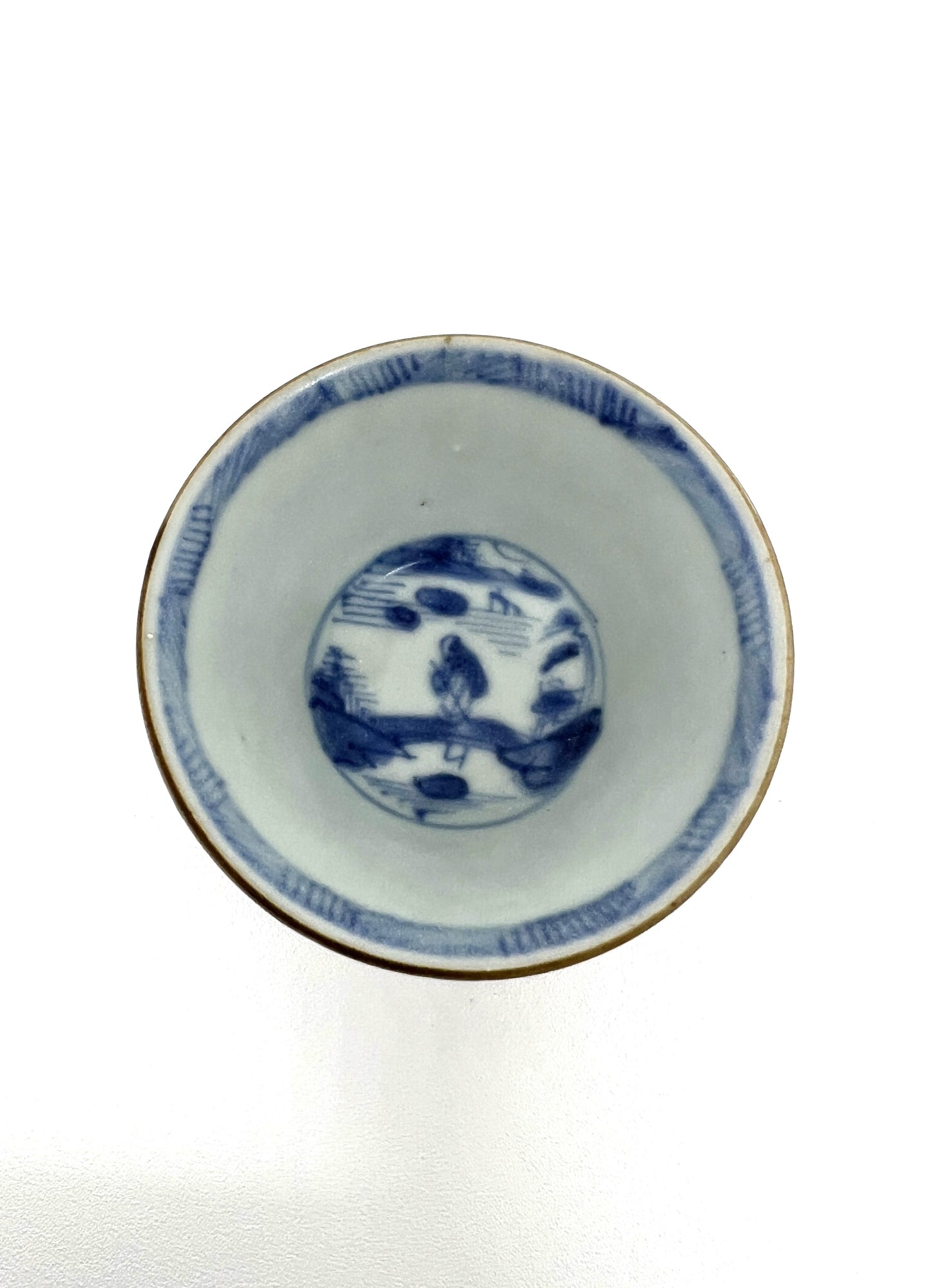 PASSING BOAT AND BRIDGE PATTERN BLUE AND WHITE TEABOWL AND SAUCER SET CIRCA 1725, QING DYNASTY, YONGZHENG ERA