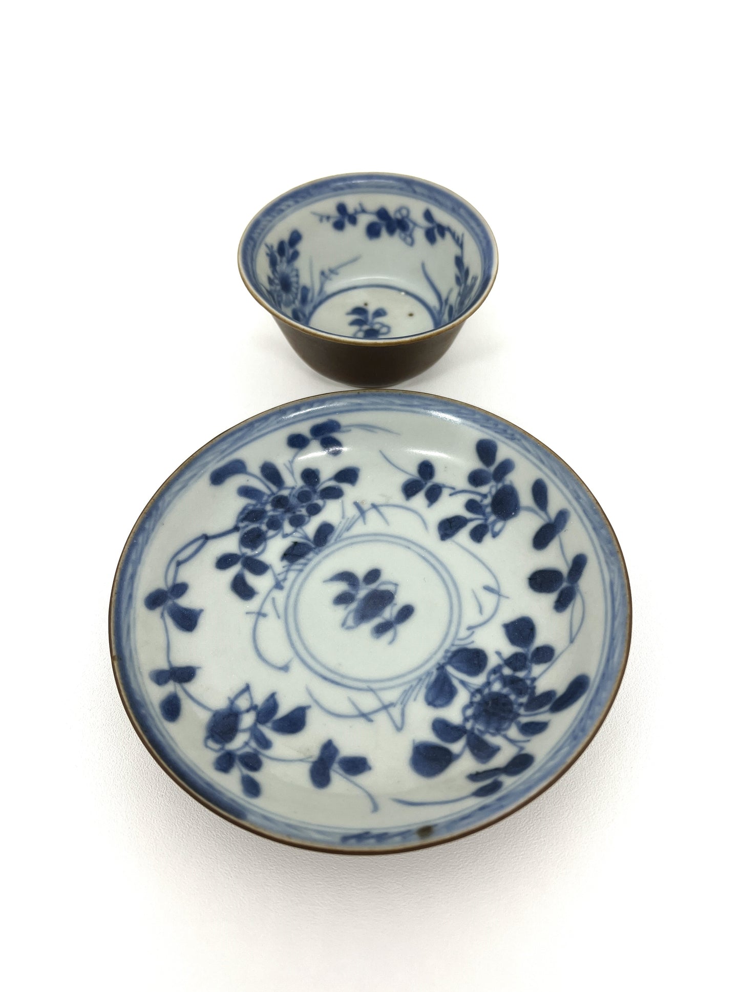 BLUE AND WHITE TEABOWL AND SAUCER SET CIRCA 1725, QING DYNASTY, YONGZHENG ERA