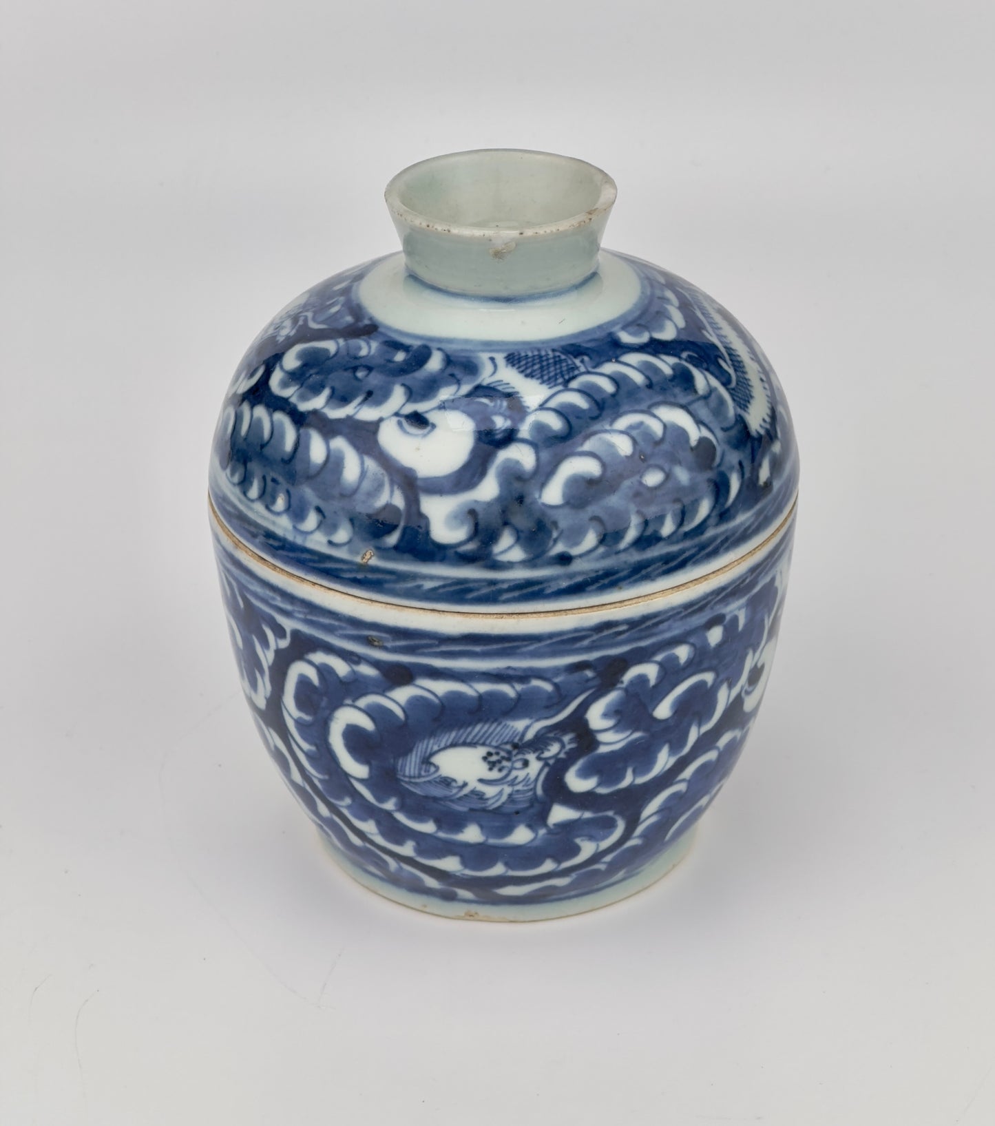 Blue and white Porcelain Covered Jar with Dragons amidst Clouds, Qing Period