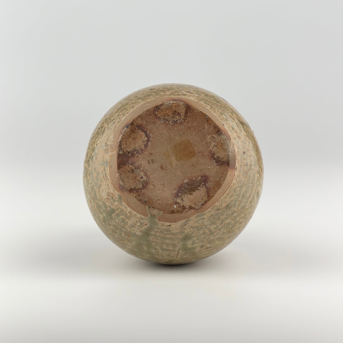 A RARE YUE CELADON CHICKEN-HEAD EWER, JIN-SOUTHERN DYNASTY