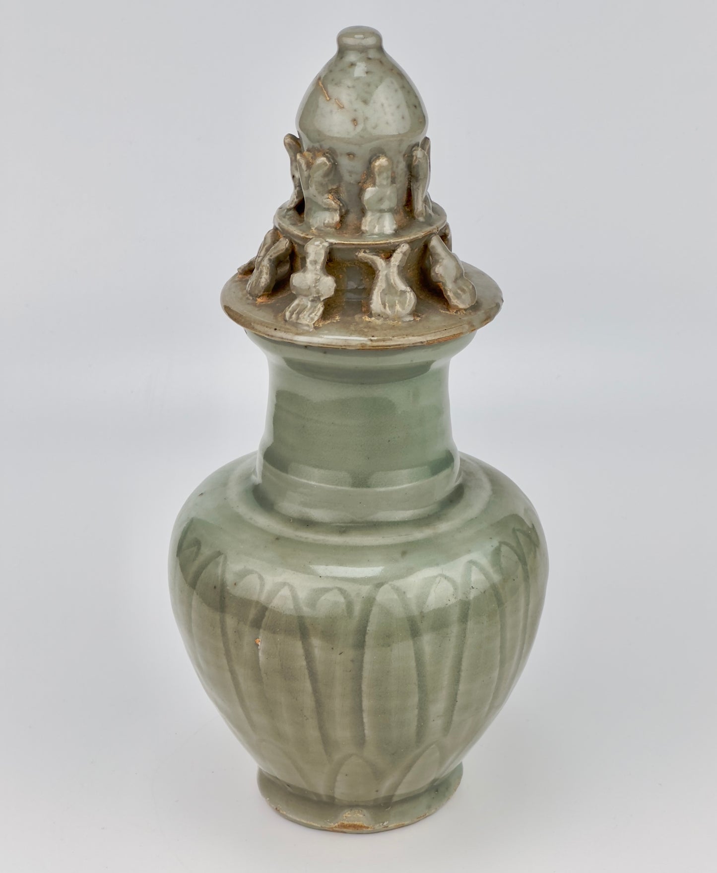 Carved 'Longquan' Celadon-glazed Funerary vase and cover, Song dynasty