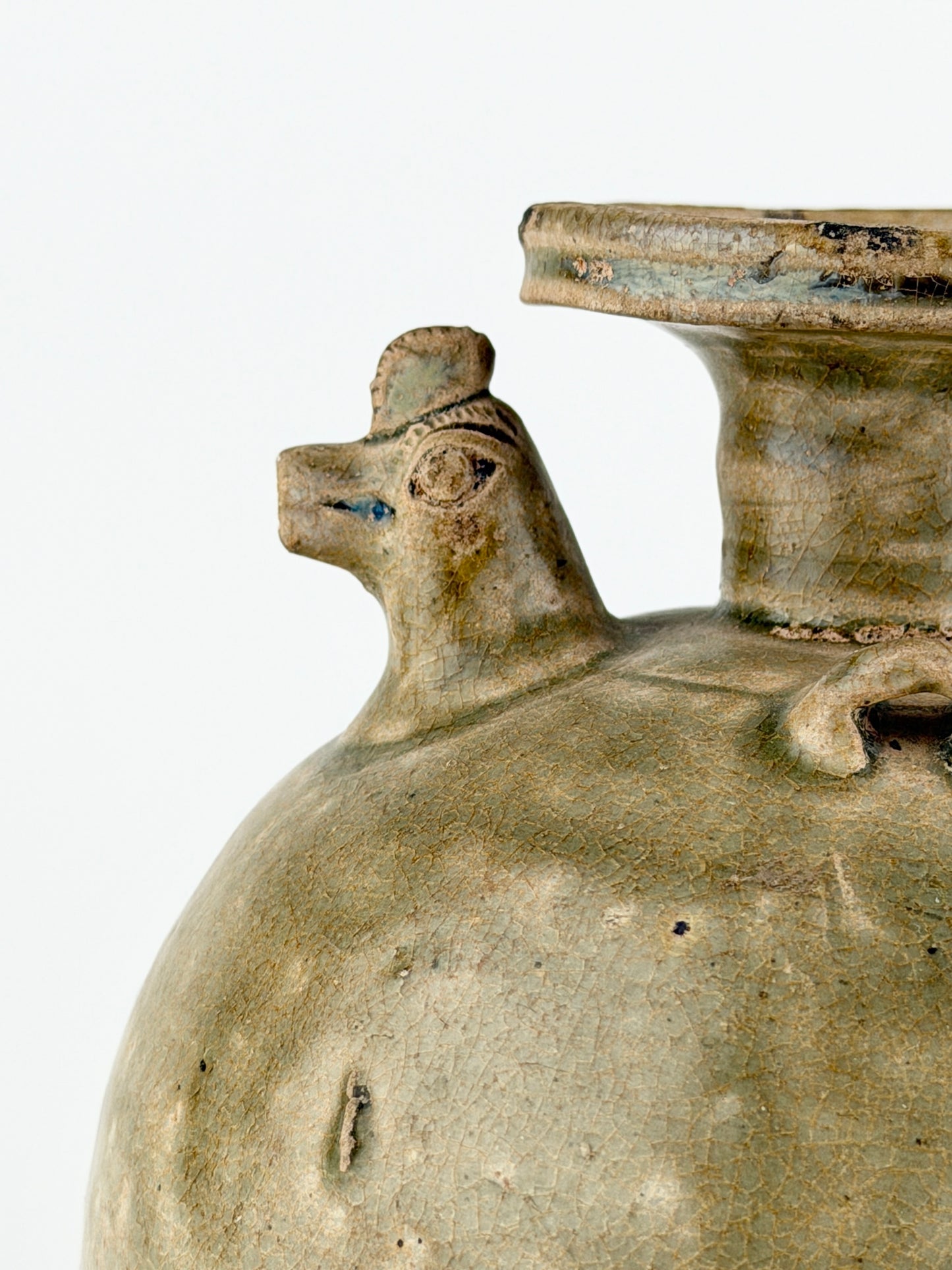 A RARE YUE CELADON CHICKEN-HEAD EWER, JIN-SOUTHERN DYNASTY