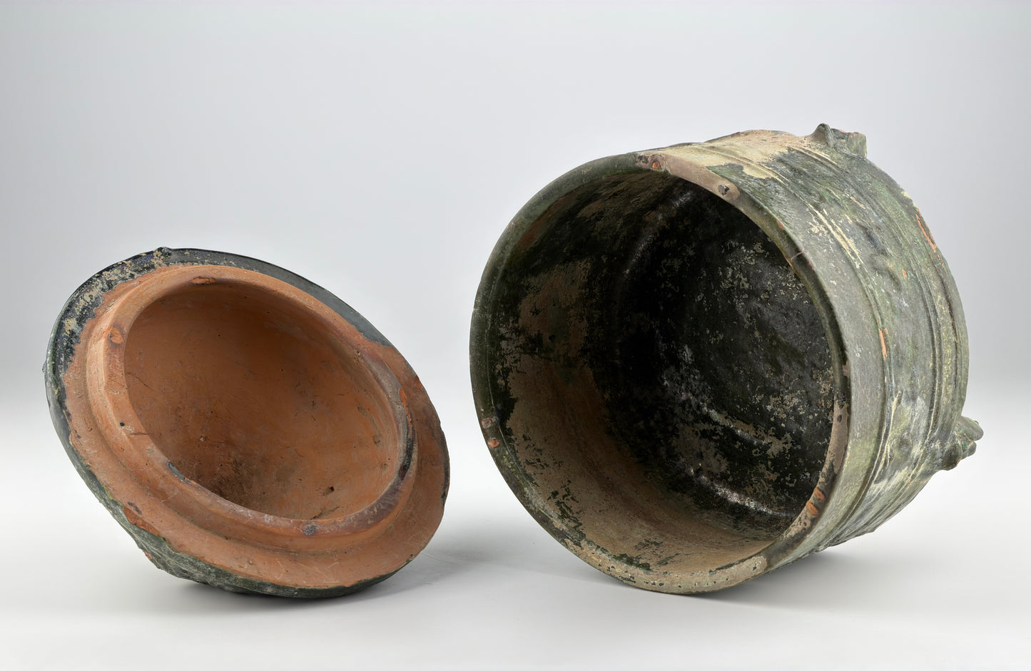 GREEN-GLAZED POTTERY TRIPOD 'HILL' JAR, HAN DYNASTY, 206 BC - 220 AD