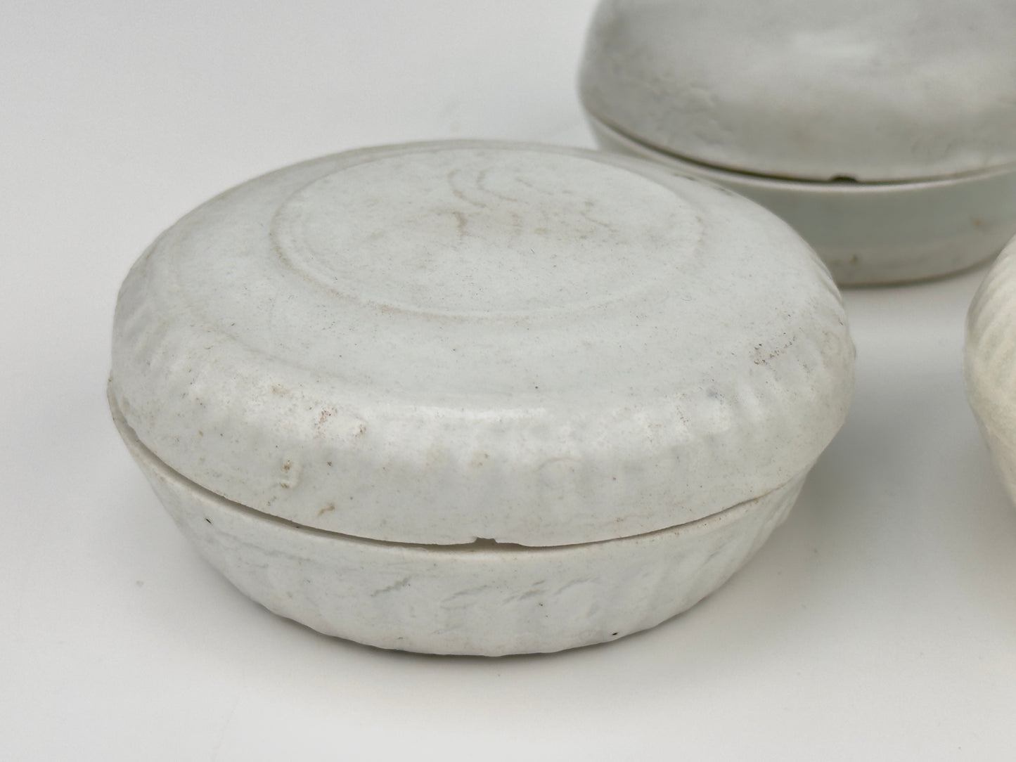 Three Small White-glazed Circular Boxes and Coveres, Qing Dynasty, Kangxi Era, Circa 1690