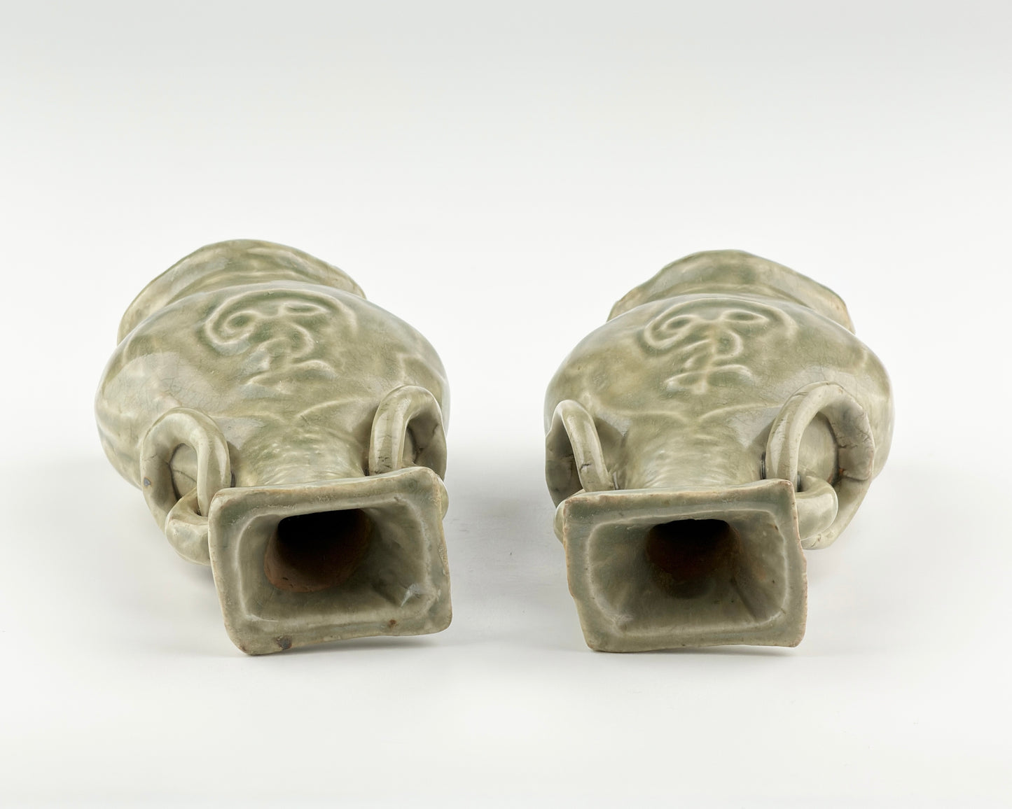 TWO MOLDED LONGQUAN CELADON 'FU SHOU' VASES, MING DYNASTY