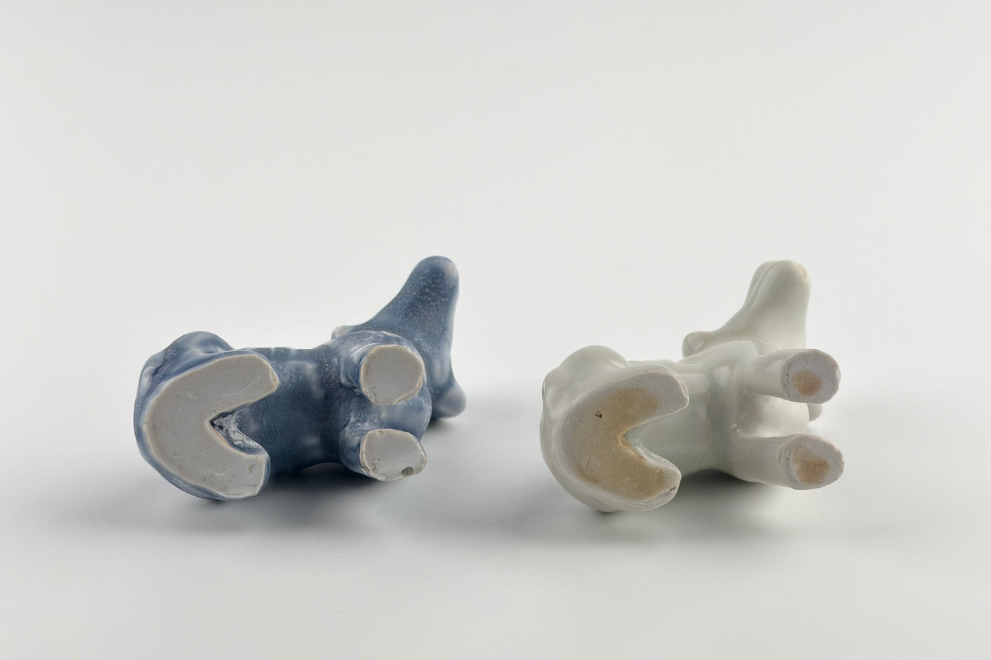 Two Miniature White Figure of Seated Hounds, Circa 1725, Qing Dynasty, Yongzheng reign