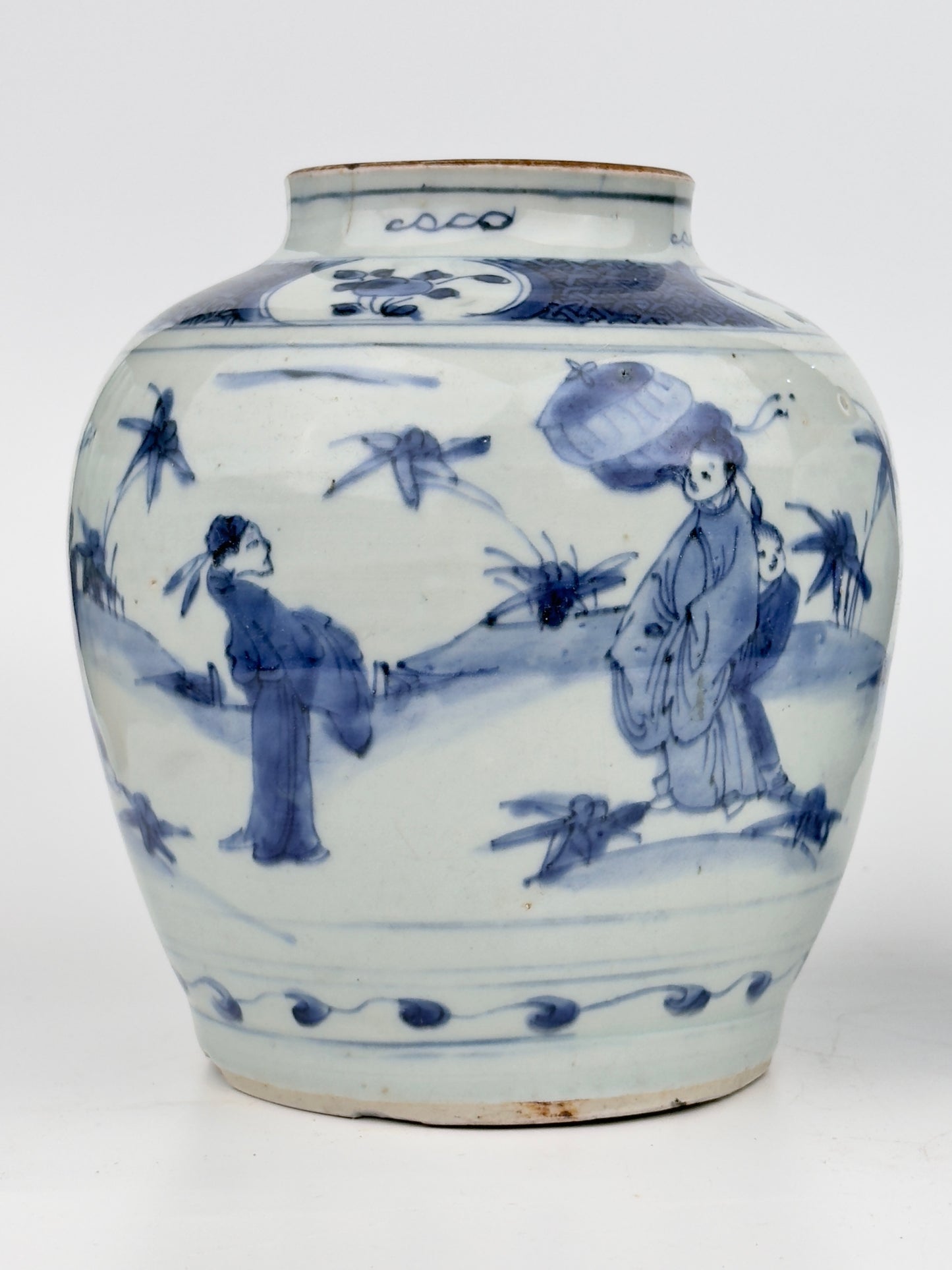 Two Chinese blue and white jars, painted with eight figures in a garden, marked on the bottom with a sitting rabbit(blue hare), Transitional period(Late Ming dynasty)