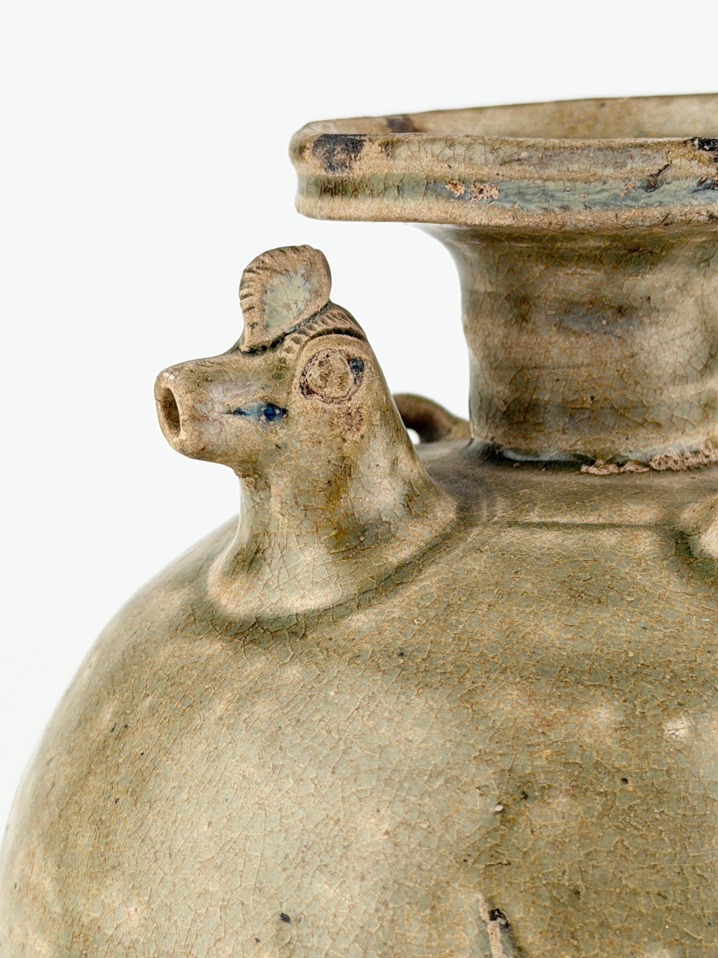 A RARE YUE CELADON CHICKEN-HEAD EWER, JIN-SOUTHERN DYNASTY