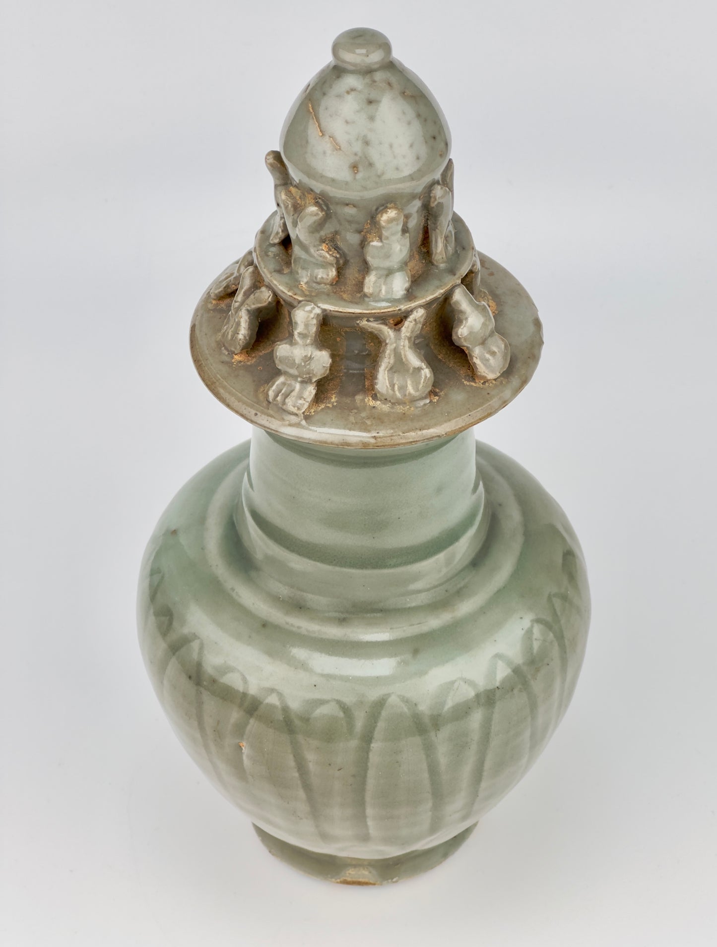 Carved 'Longquan' Celadon-glazed Funerary vase and cover, Song dynasty