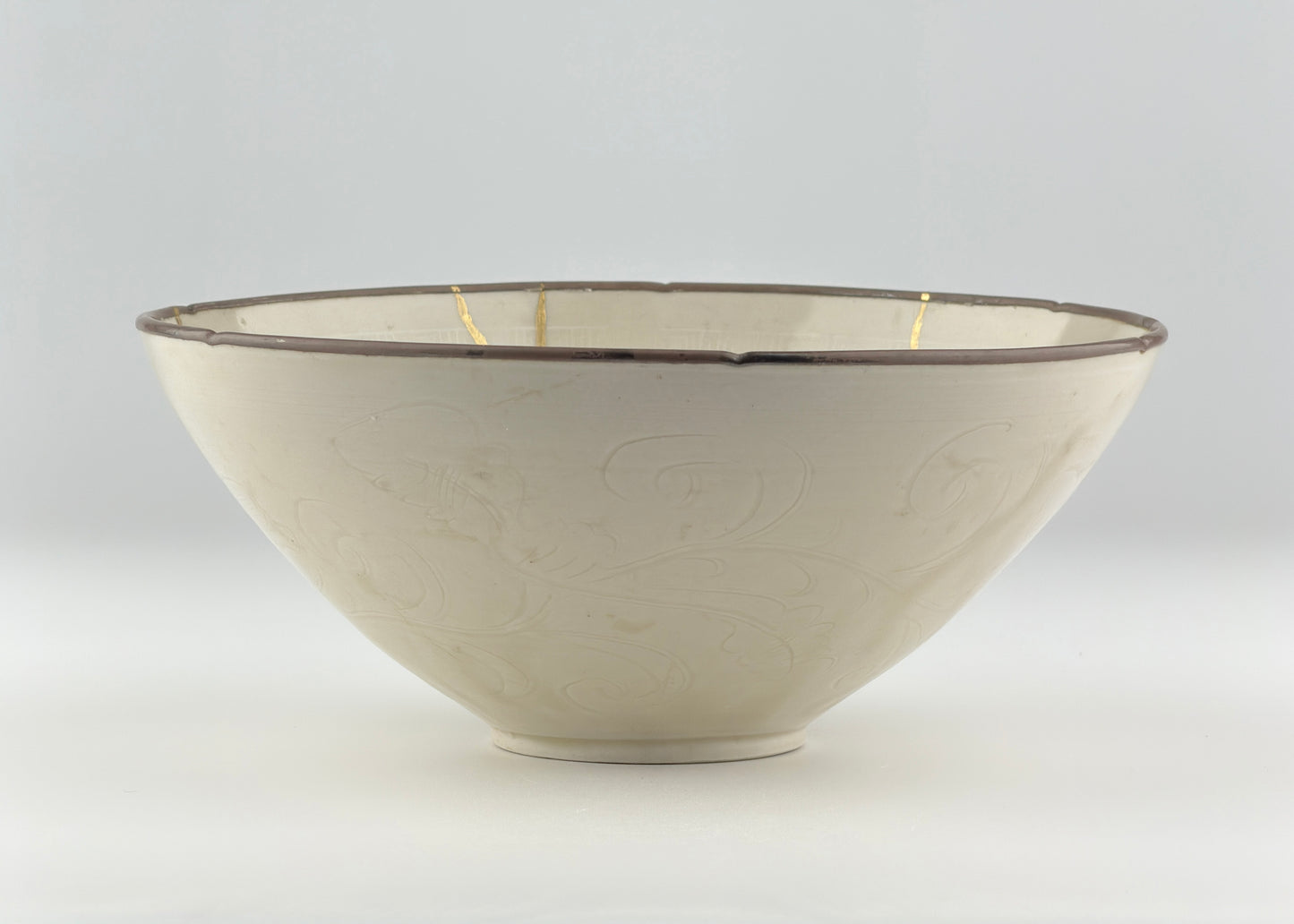 RARE MOULDED DINGYAO 'CRANES AND FISHES' BOWL, SONG DYNASTY