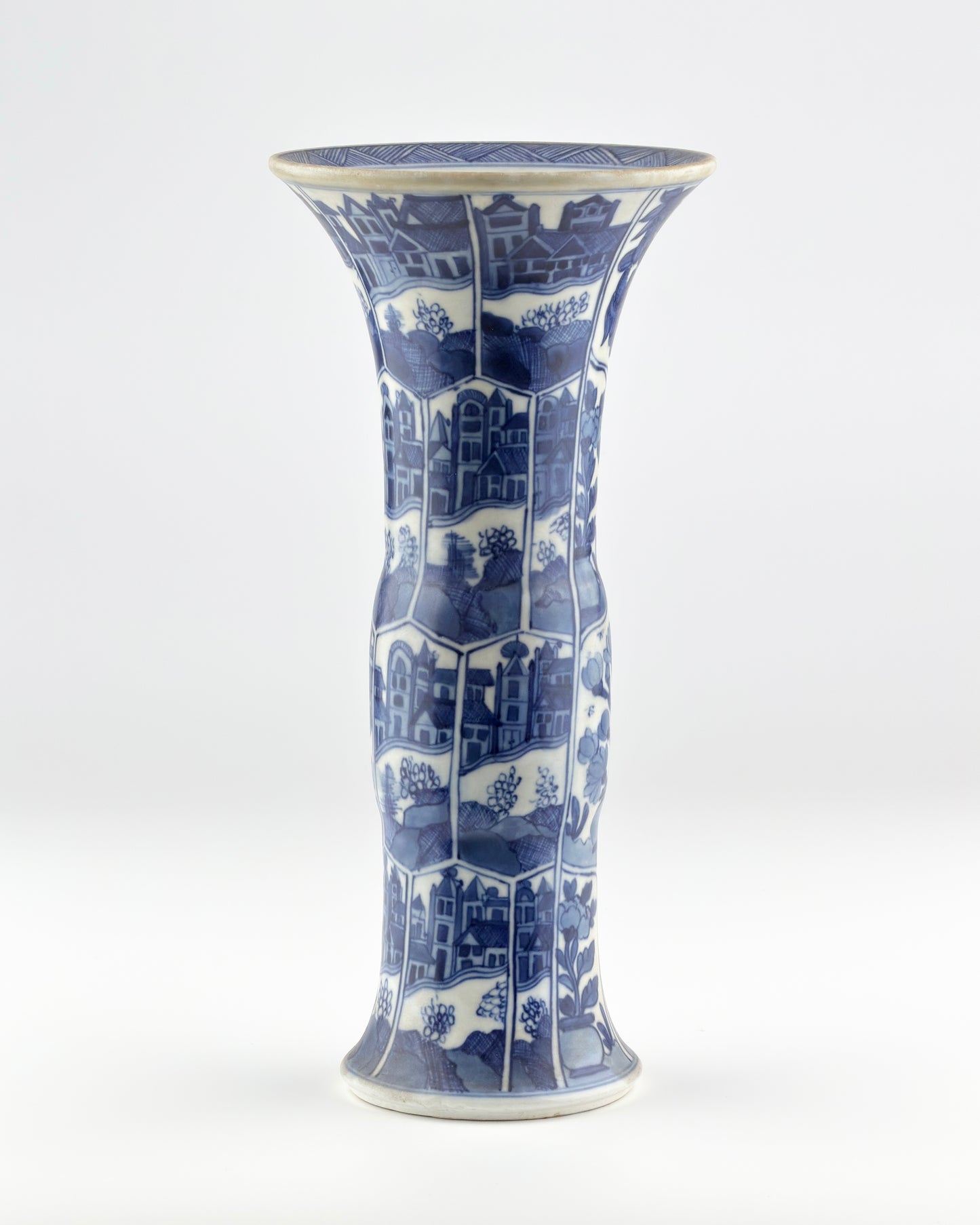 BLUE AND WHITE ANCIENT GU SHAPE 'CANAL HOUSES' VASE, QING DYNASTY, KANGXI ERA, CIRCA 1690