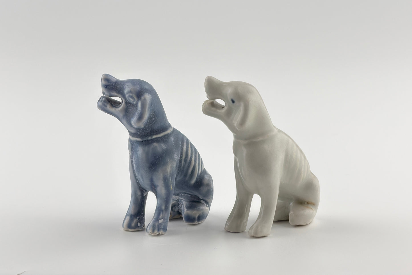 Two Miniature White Figure of Seated Hounds, Circa 1725, Qing Dynasty, Yongzheng reign