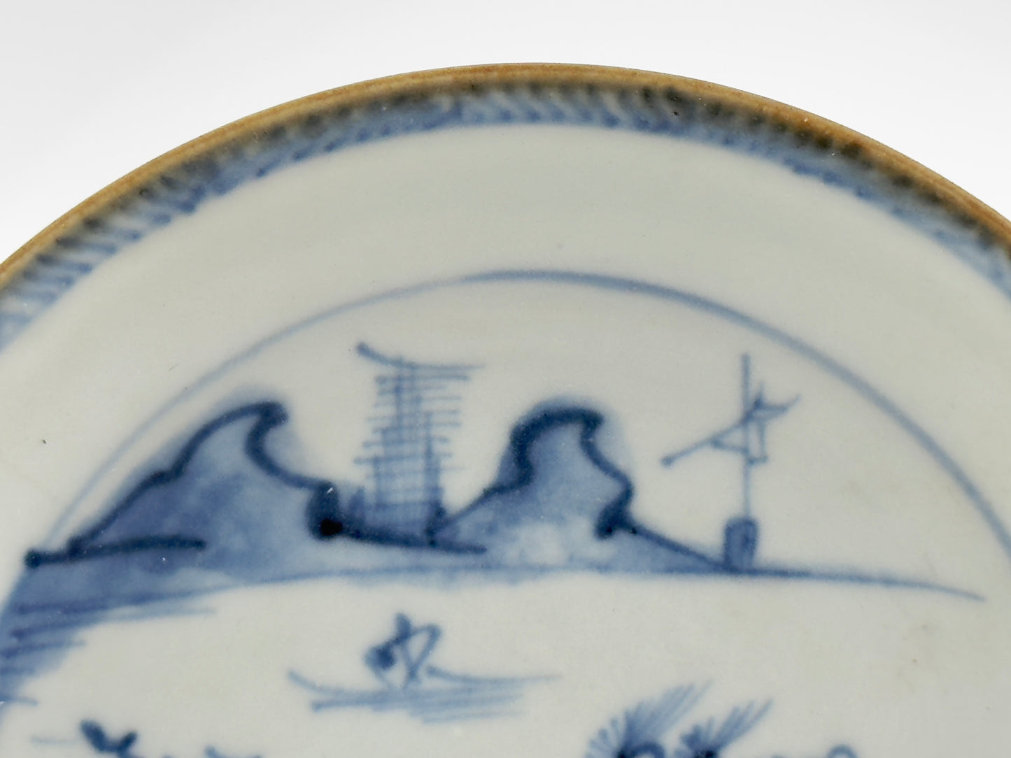 PASSING BOAT AND FIGURE PATTERN BLUE AND WHITE SAUCER, CIRCA 1725, QING DYNASTY, YONGZHENG ERA