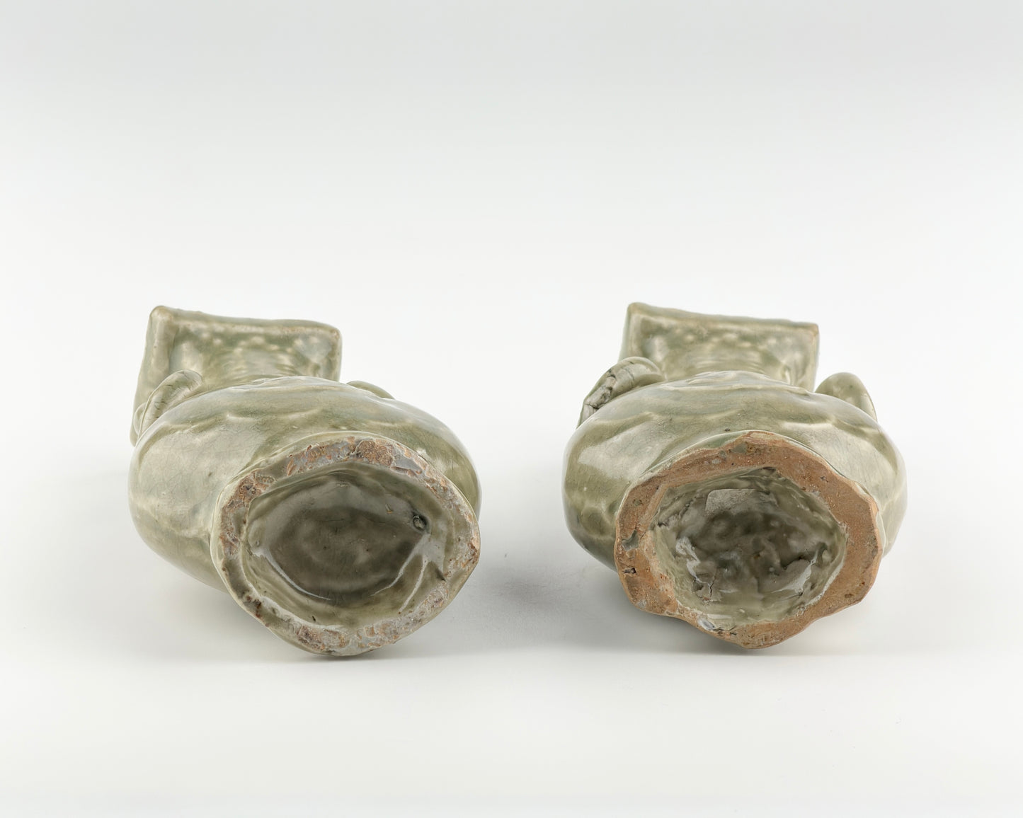 TWO MOLDED LONGQUAN CELADON 'FU SHOU' VASES, MING DYNASTY