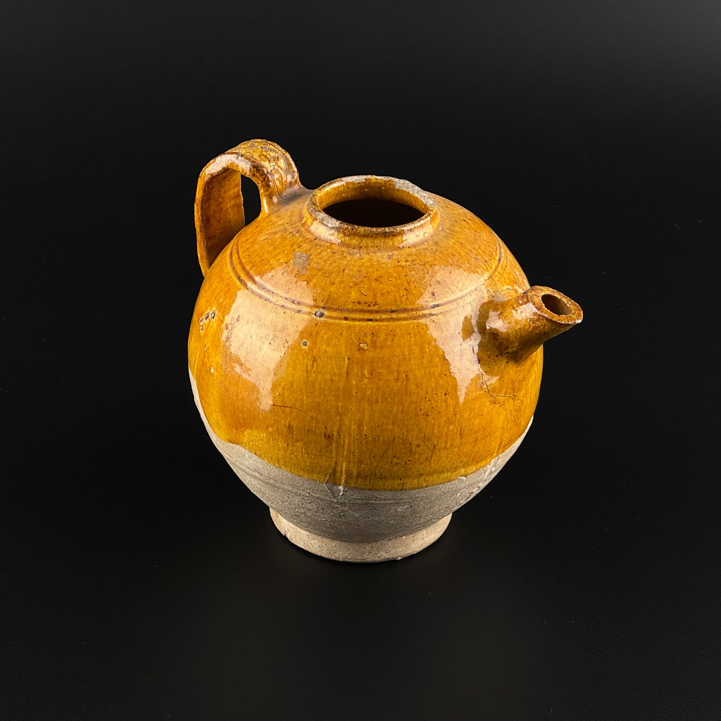 AMBER-GLAZED POTTERY EWER, TANG-LIAO DYNASTY (7-12TH CENTURY)