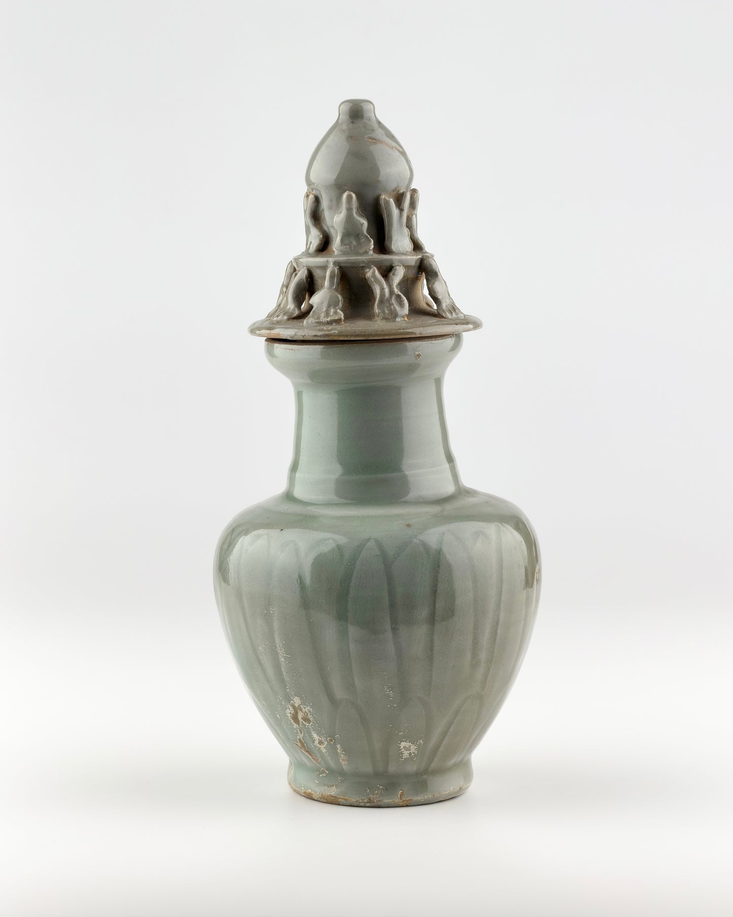 Carved 'Longquan' Celadon-glazed Funerary vase and cover, Song dynasty