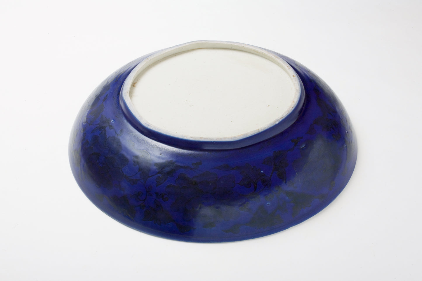 Large Rare Blue-Glazed 'Rockwork and Flowers' Dish, Qing Dynasty