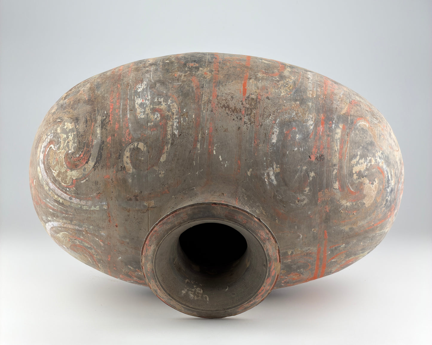 COCOON-SHAPED JAR WITH CLOUD-SCROLL DESIGN, HAN DYNASTY
