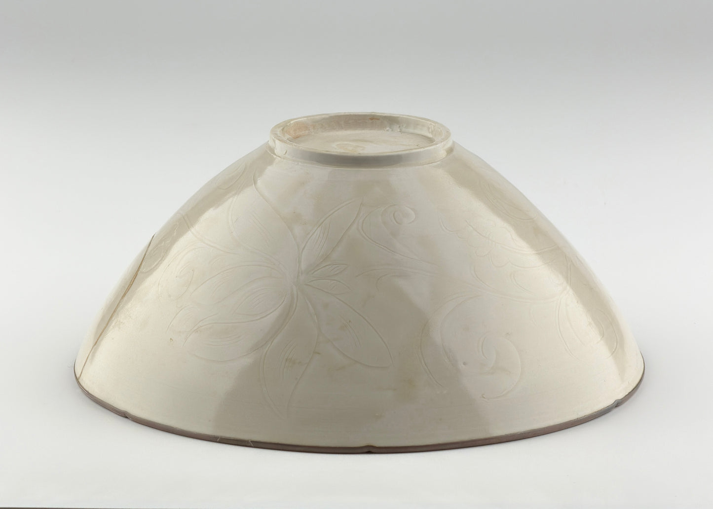 RARE MOULDED DINGYAO 'CRANES AND FISHES' BOWL, SONG DYNASTY