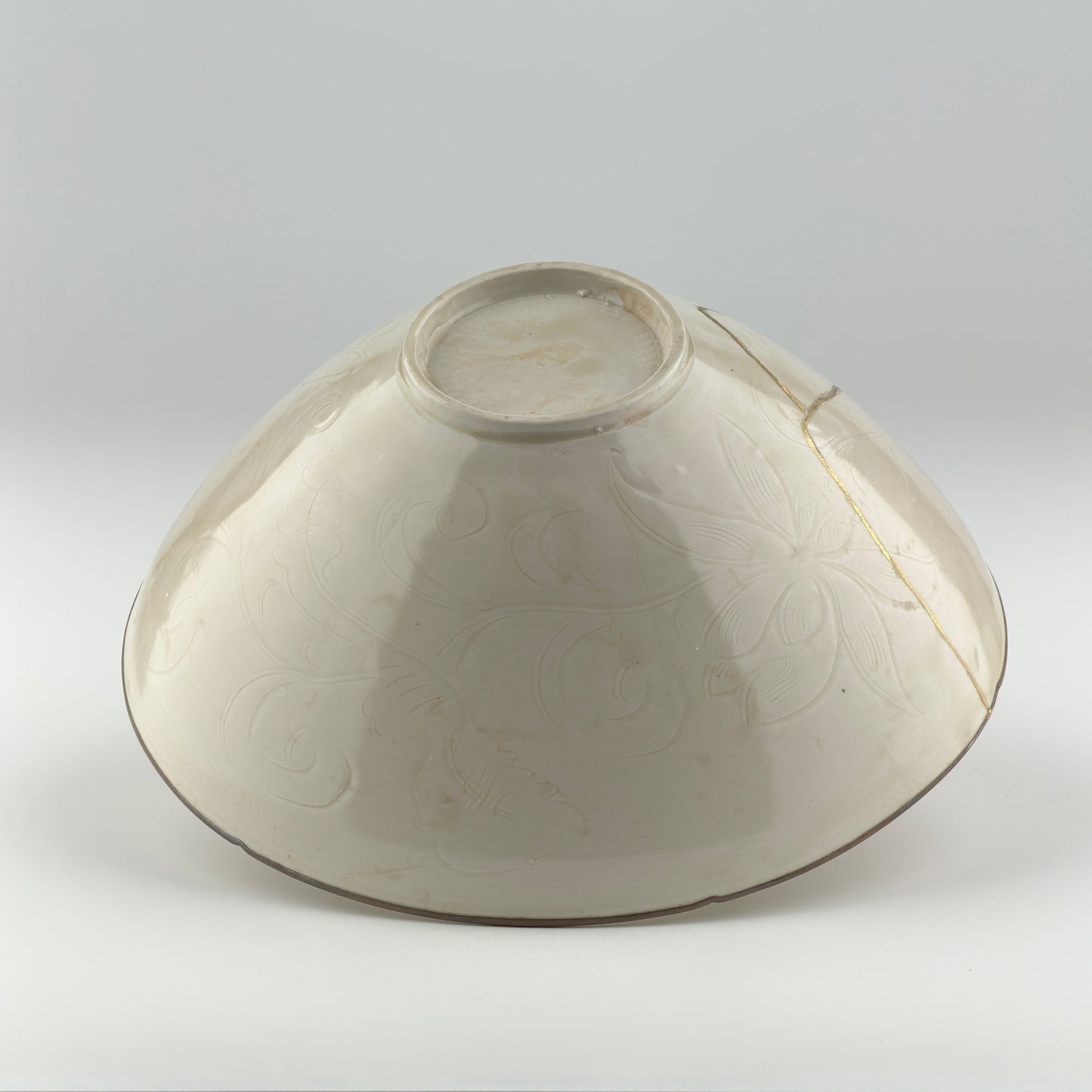 RARE MOULDED DINGYAO 'CRANES AND FISHES' BOWL, SONG DYNASTY
