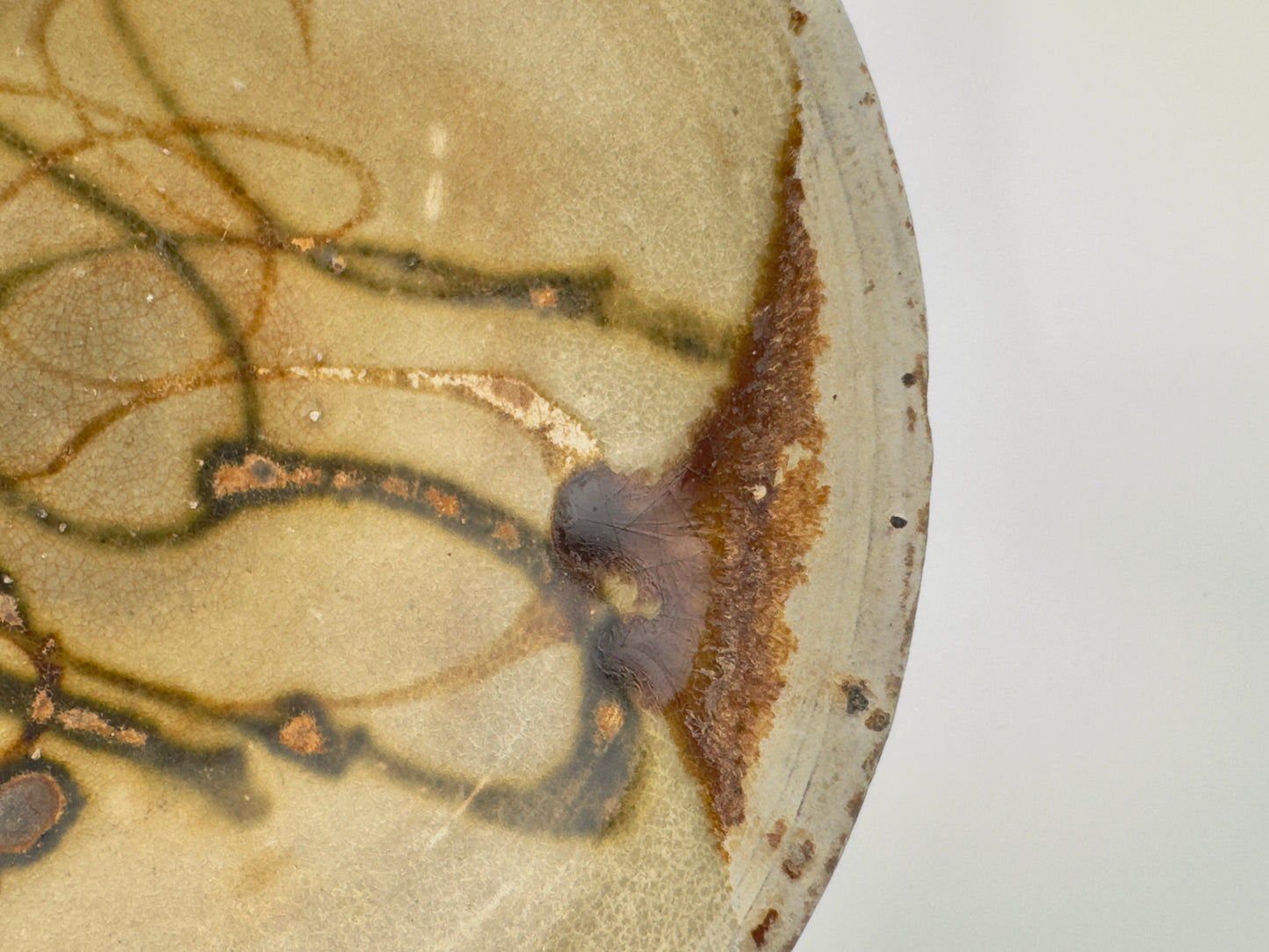 BELITUNG SHIP, CHANGSHA BOWL WITH ABSTRACT PATTERNS PRESUMED TO BE ISLAMIC SYMBOLS, TANG PERIOD