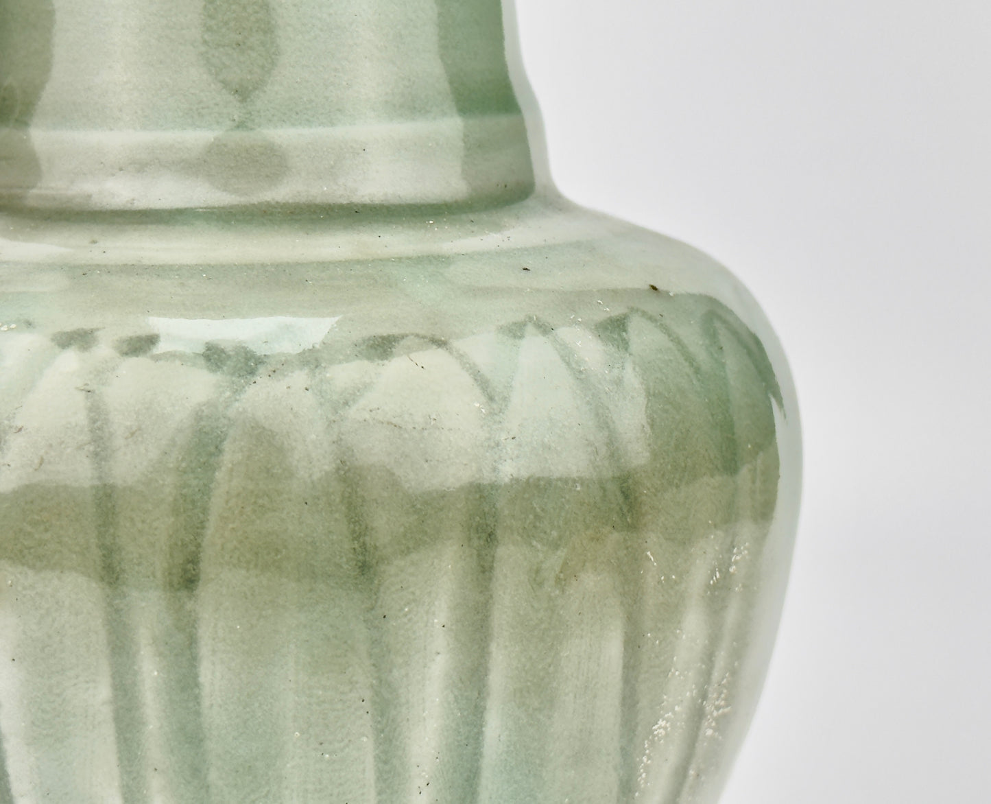 Carved 'Longquan' Celadon-glazed Funerary vase and cover, Song dynasty