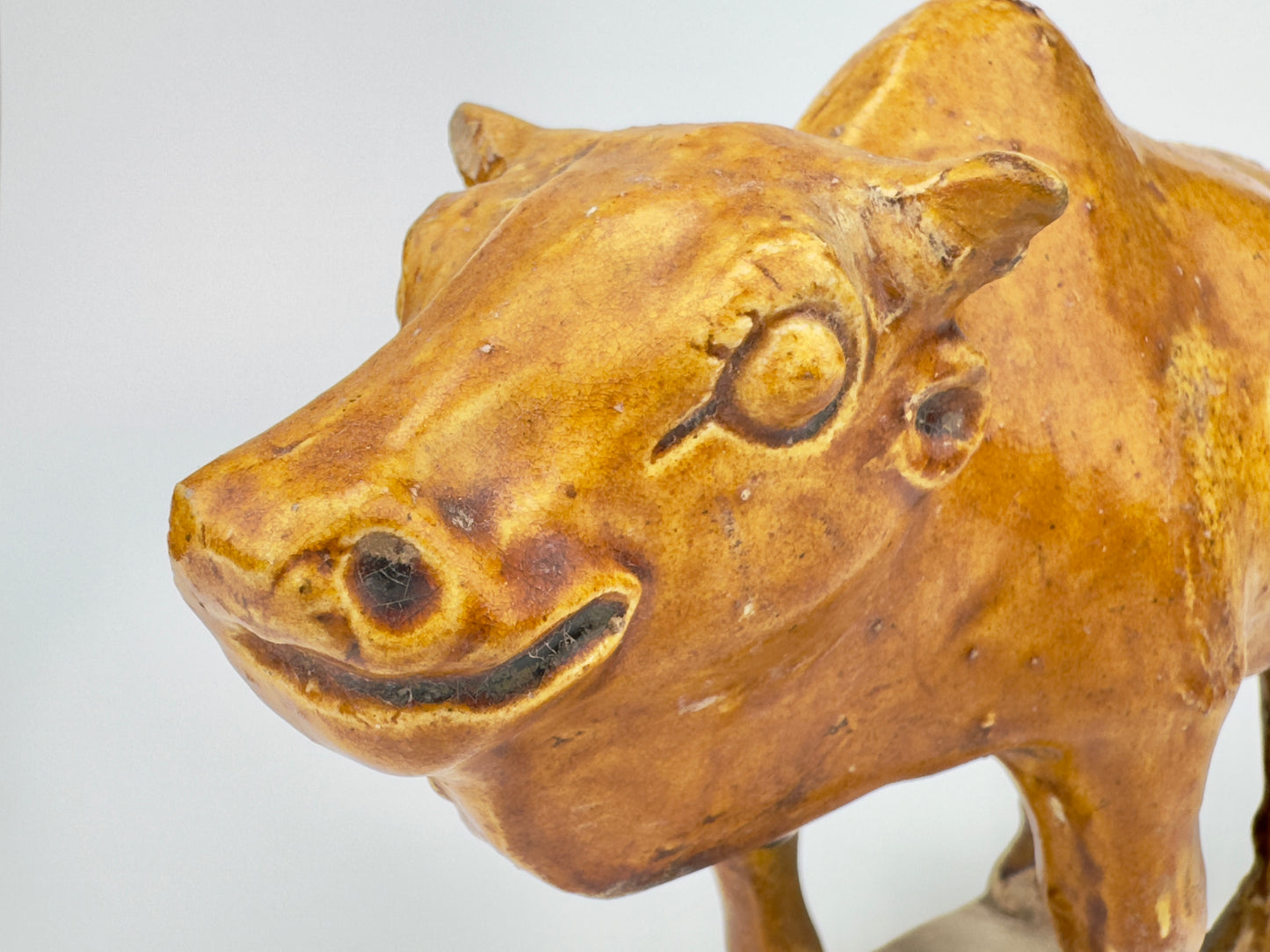 AMBER-GLAZED POTTERY FIGURE OF TWO SACRED BULLS, TANG-LIAO DYNASTY (7-12TH CENTURY)