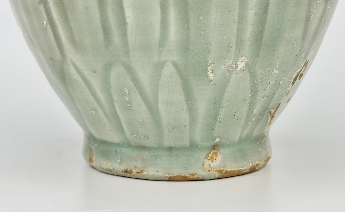 Carved 'Longquan' Celadon-glazed Funerary vase and cover, Song dynasty