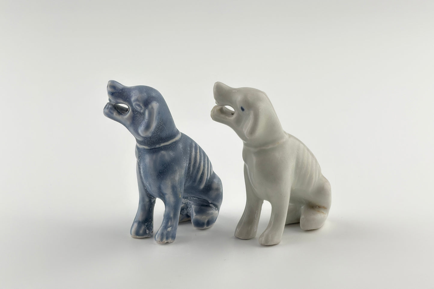 Two Miniature White Figure of Seated Hounds, Circa 1725, Qing Dynasty, Yongzheng reign
