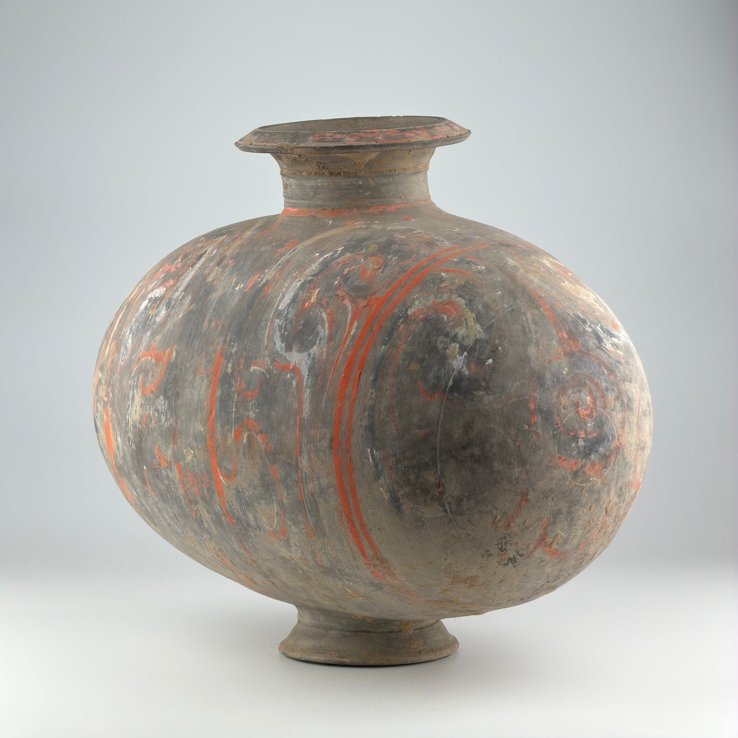 COCOON-SHAPED JAR WITH CLOUD-SCROLL DESIGN, HAN DYNASTY