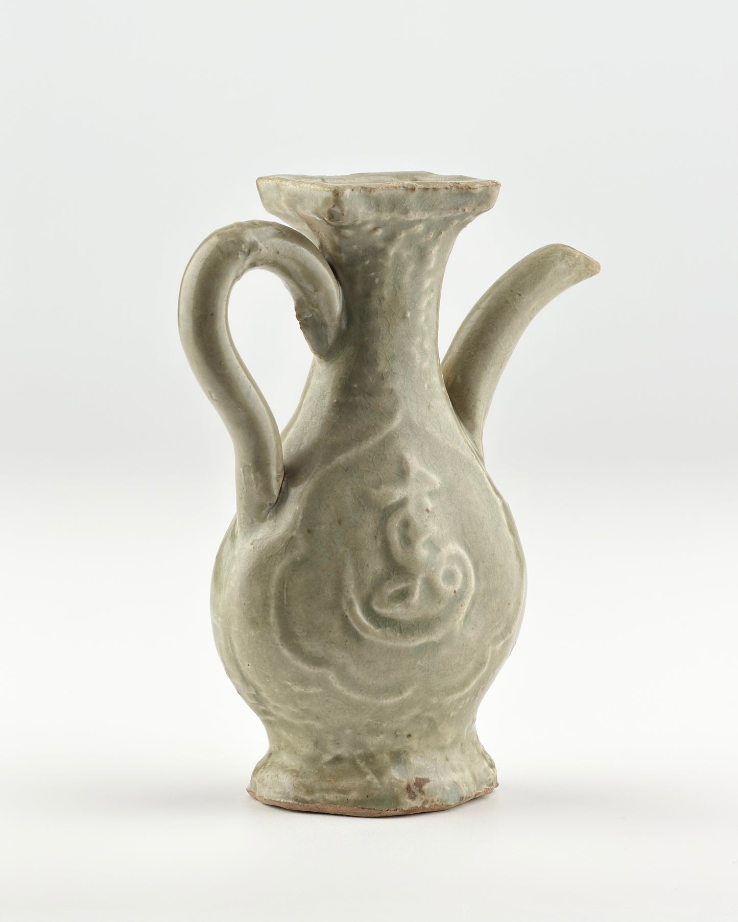 MOLDED LONGQUAN CELADON 'FU SHOU' EWER, MING DYNASTY