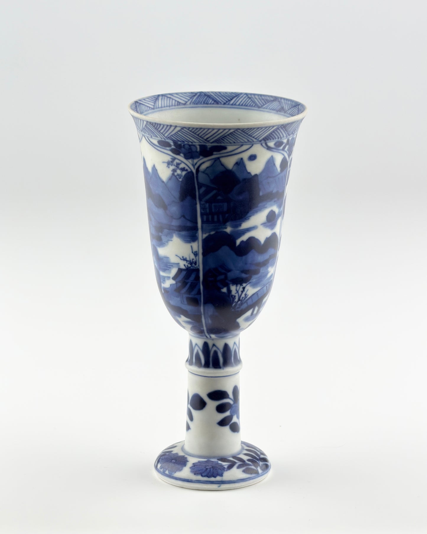 BLUE AND WHITE STEMCUP, QING DYNASTY, KANGXI ERA, CIRCA 1690