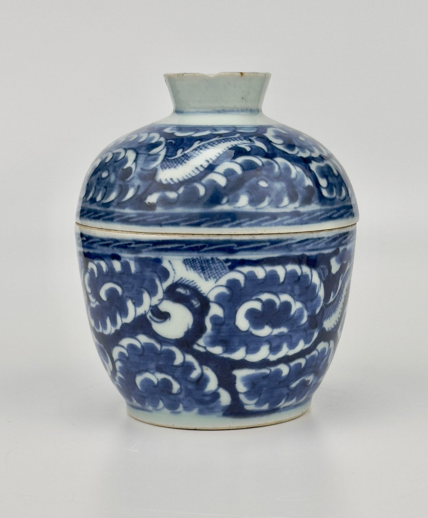 Blue and white Porcelain Covered Jar with Dragons amidst Clouds, Qing Period