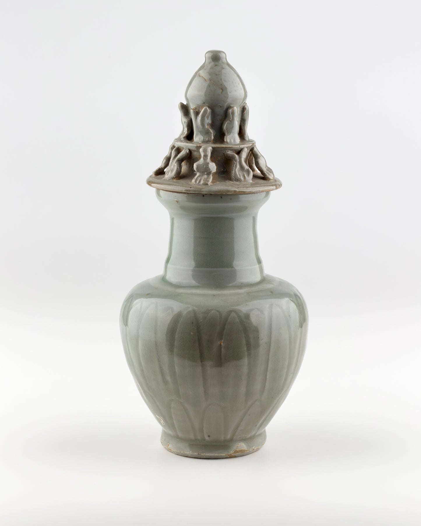 Carved 'Longquan' Celadon-glazed Funerary vase and cover, Song dynasty