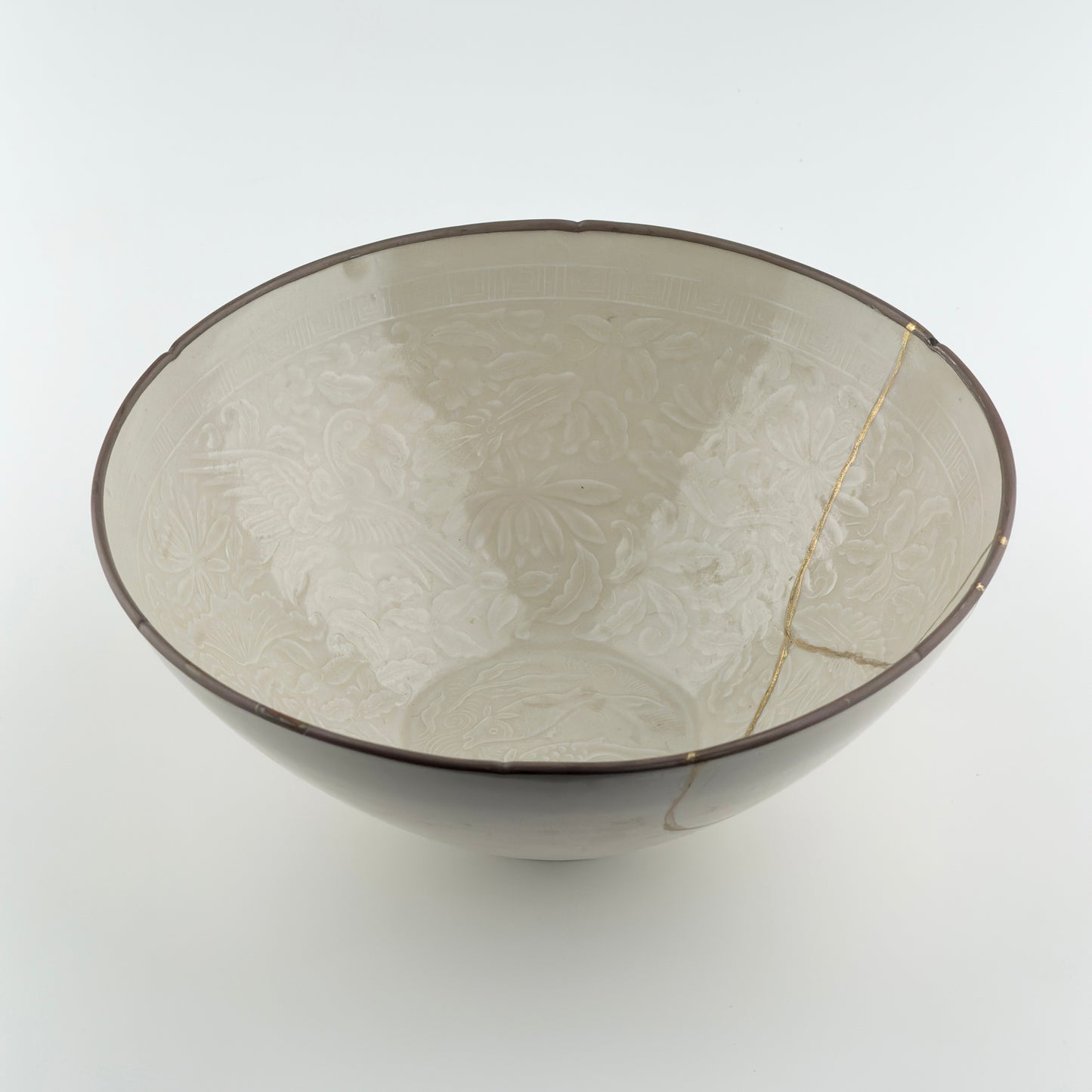 RARE MOULDED DINGYAO 'CRANES AND FISHES' BOWL, SONG DYNASTY