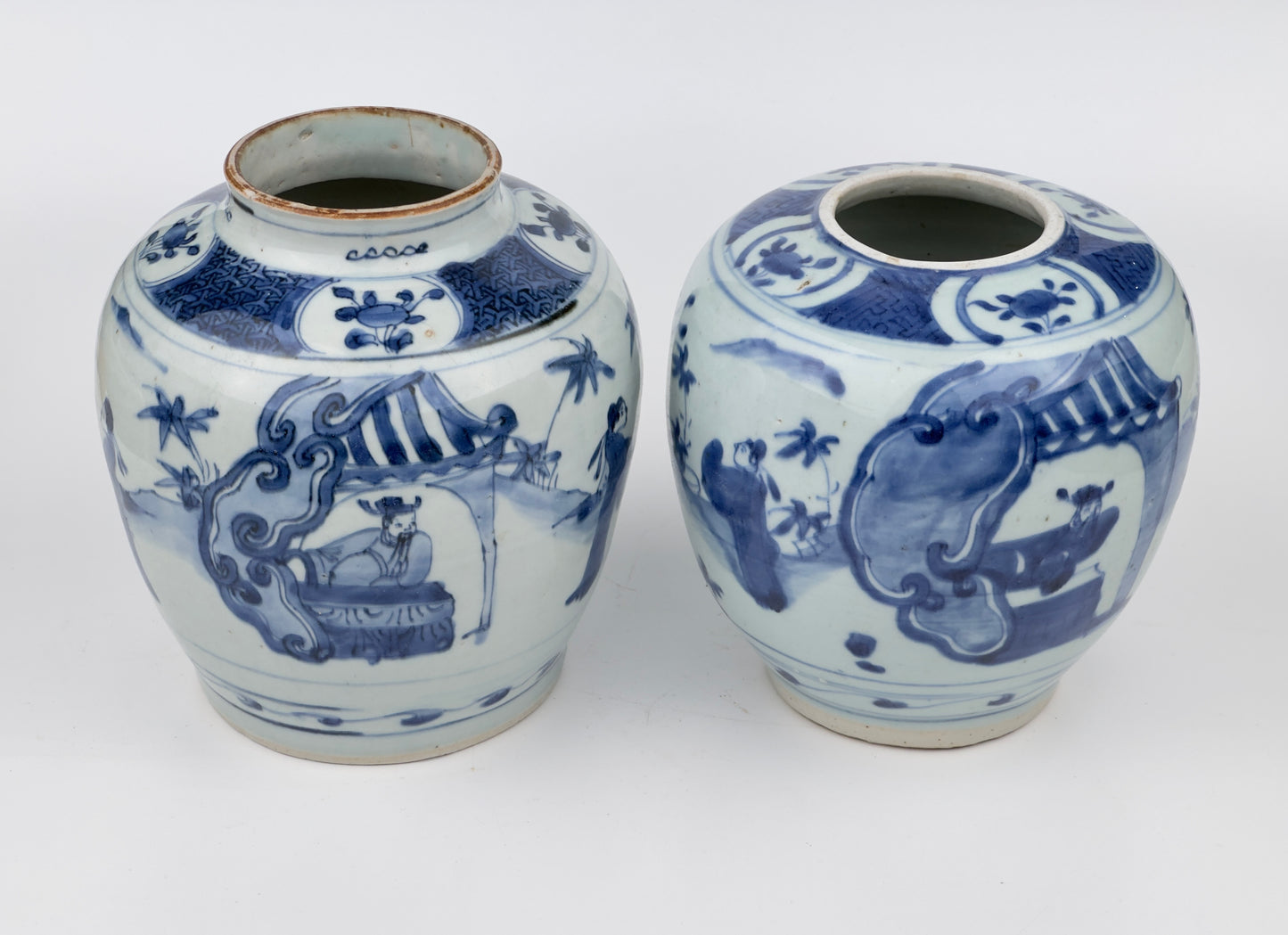 Two Chinese blue and white jars, painted with eight figures in a garden, marked on the bottom with a sitting rabbit(blue hare), Transitional period(Late Ming dynasty)