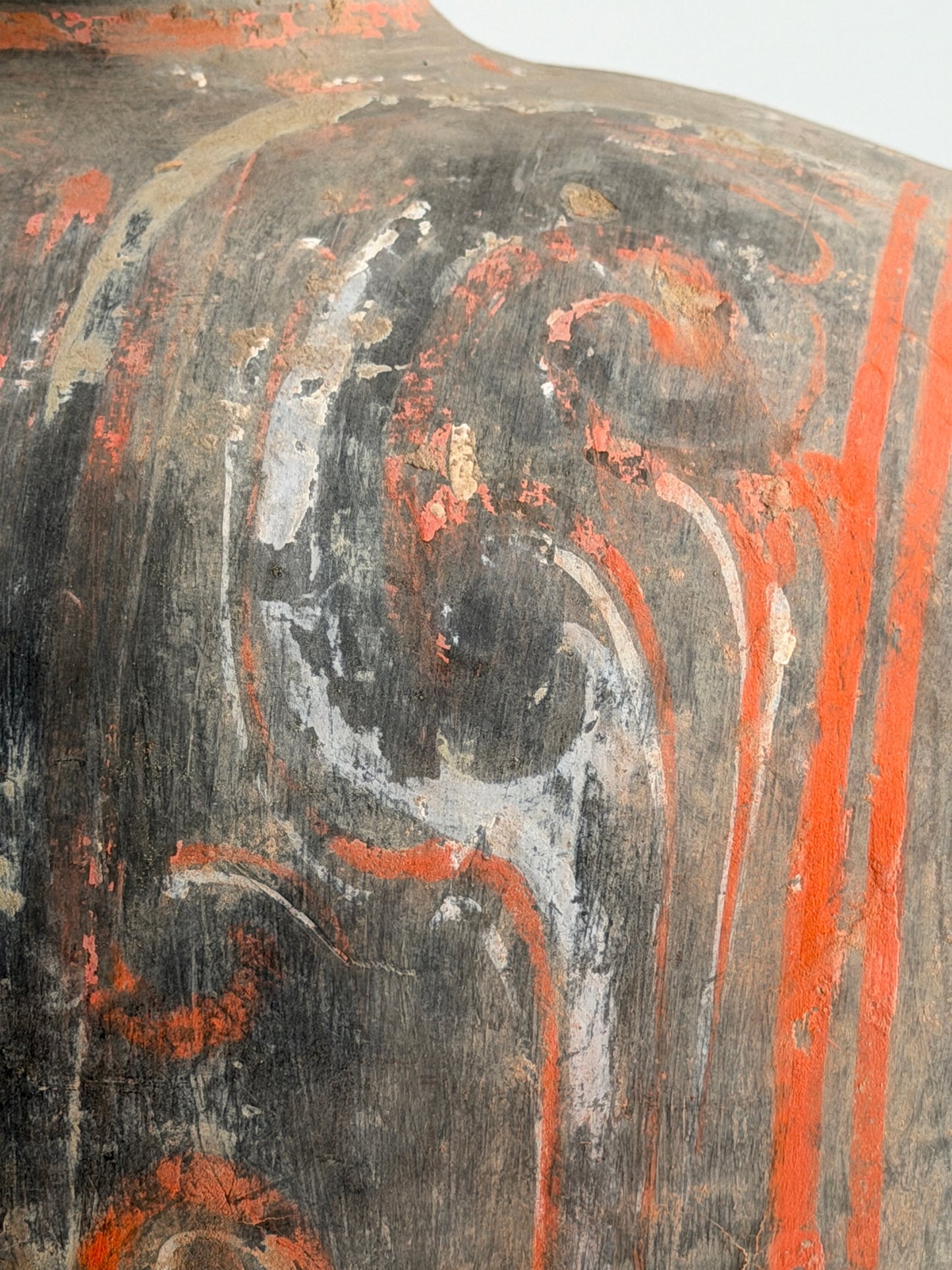 COCOON-SHAPED JAR WITH CLOUD-SCROLL DESIGN, HAN DYNASTY