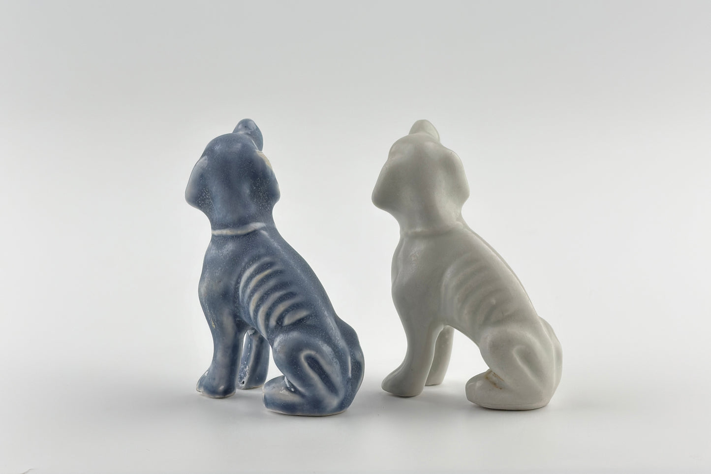 Two Miniature White Figure of Seated Hounds, Circa 1725, Qing Dynasty, Yongzheng reign