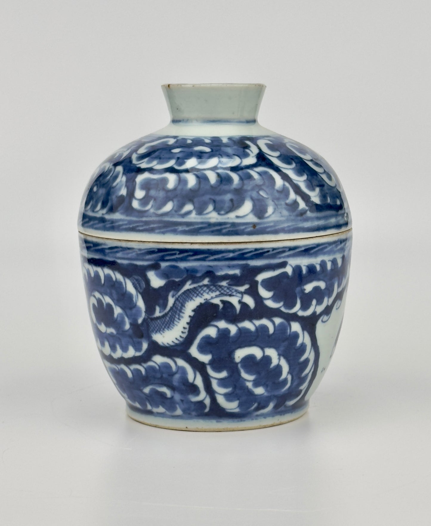 Blue and white Porcelain Covered Jar with Dragons amidst Clouds, Qing Period