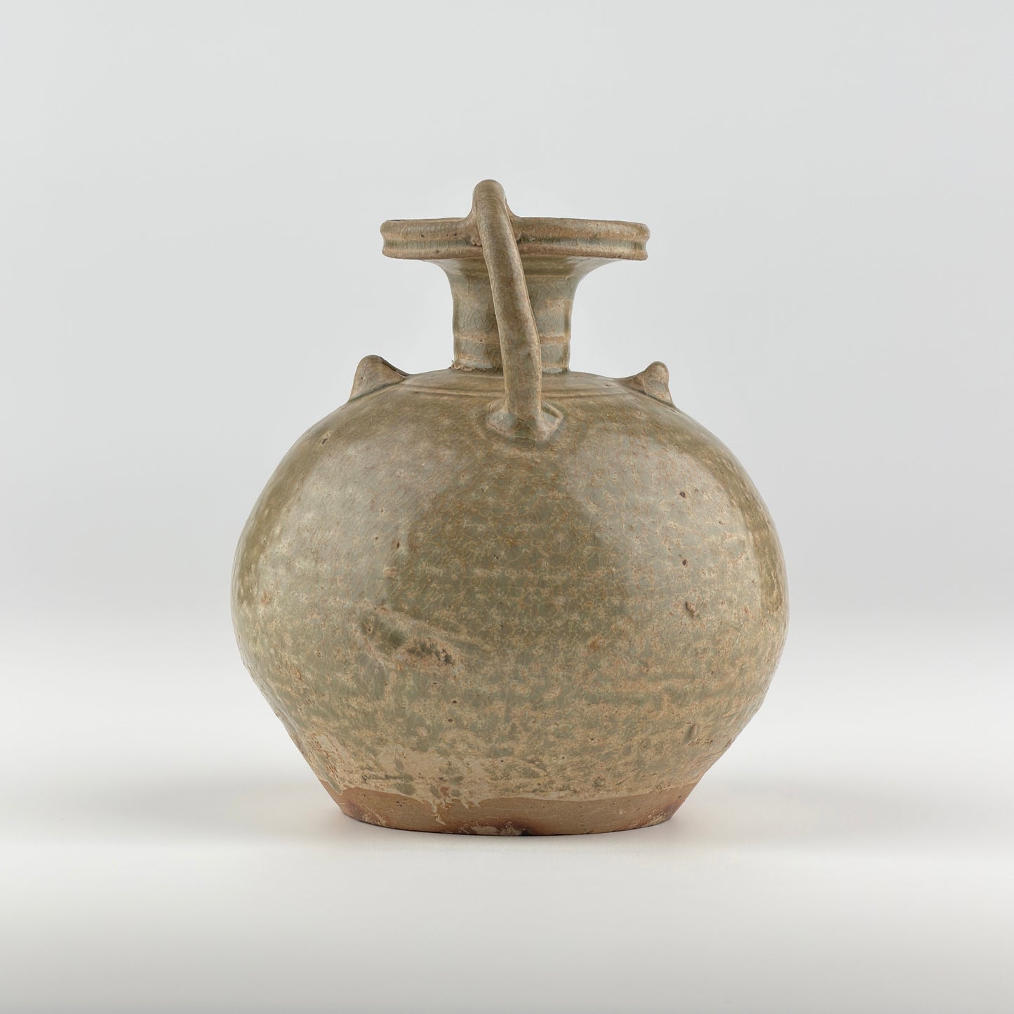 A RARE YUE CELADON CHICKEN-HEAD EWER, JIN-SOUTHERN DYNASTY