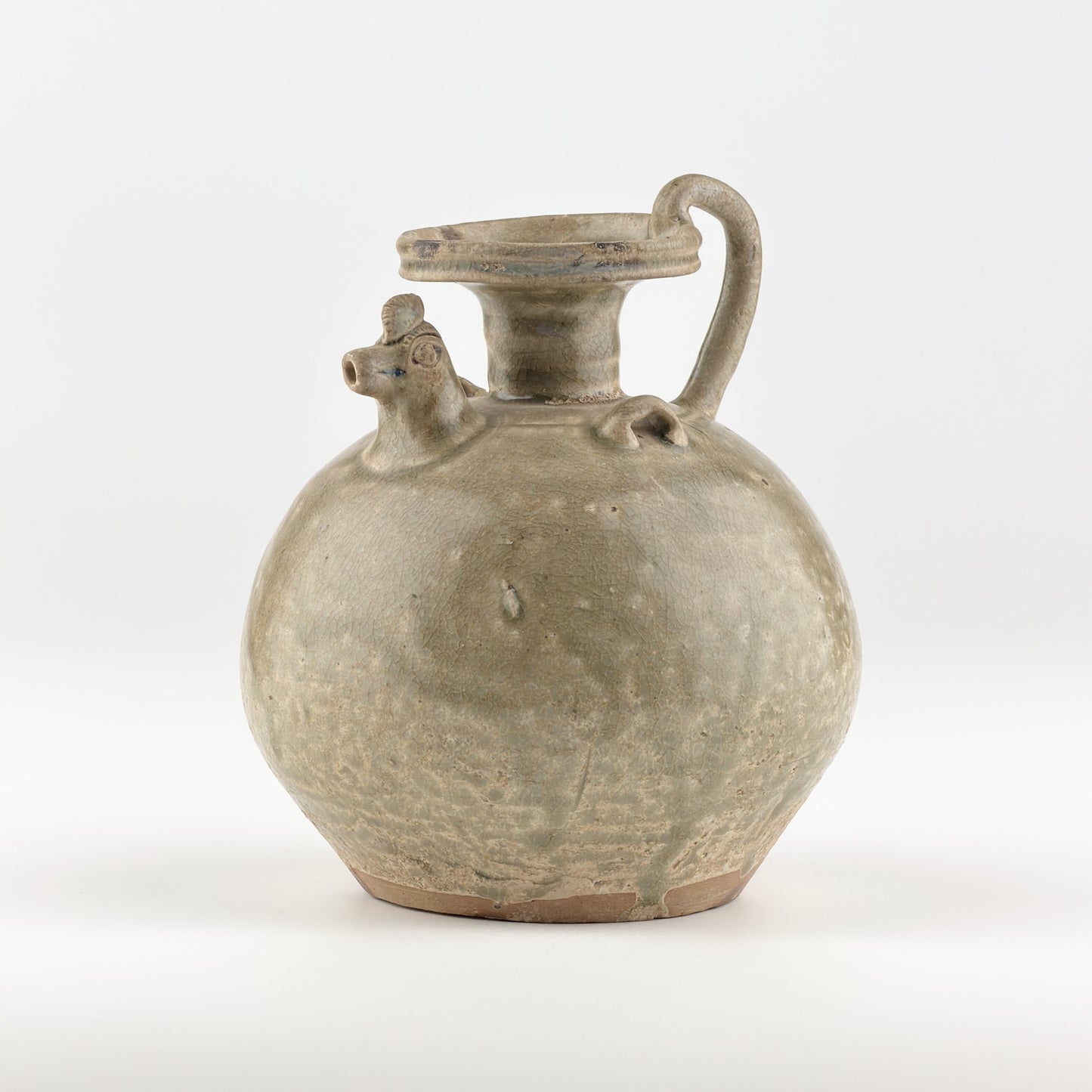 A RARE YUE CELADON CHICKEN-HEAD EWER, JIN-SOUTHERN DYNASTY