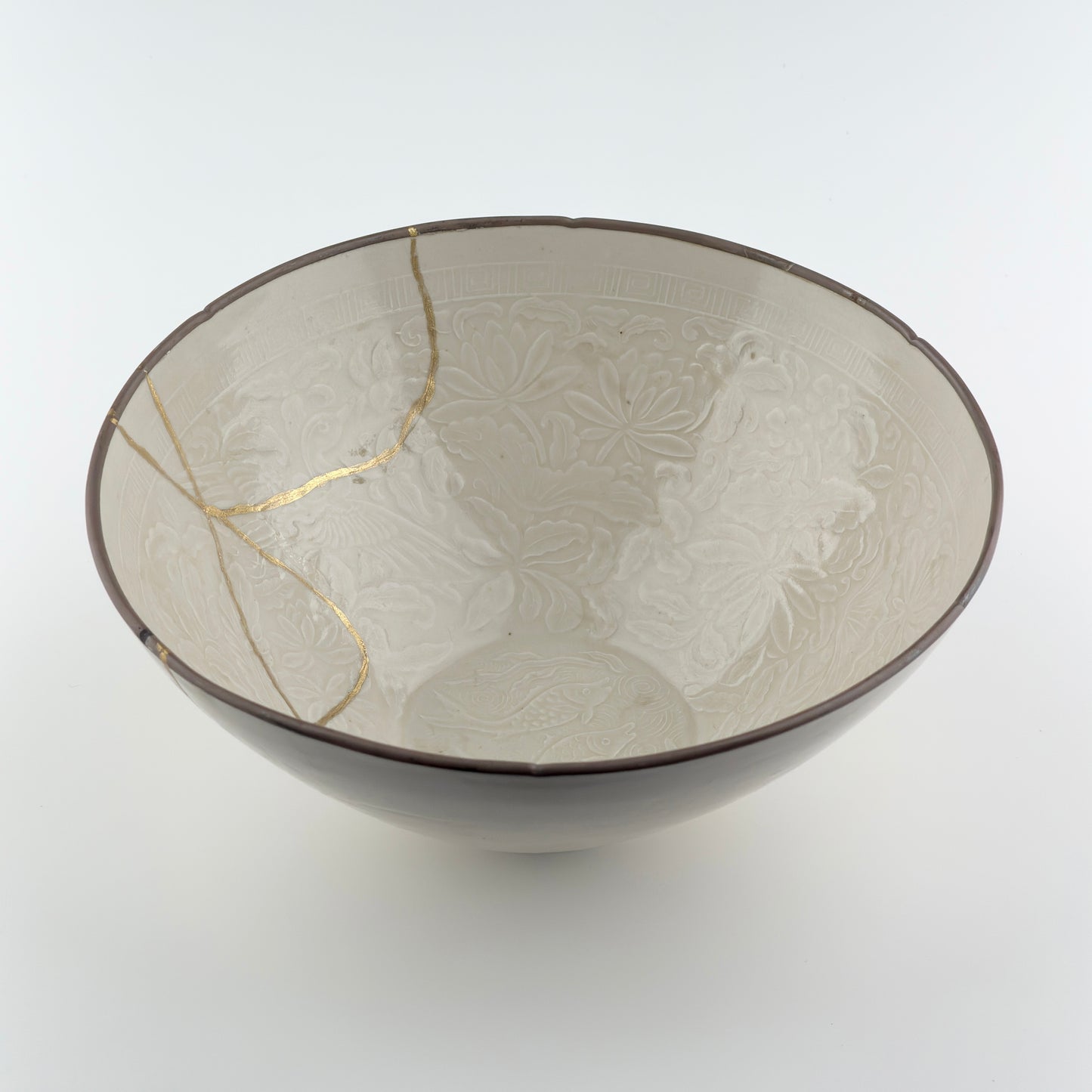 RARE MOULDED DINGYAO 'CRANES AND FISHES' BOWL, SONG DYNASTY