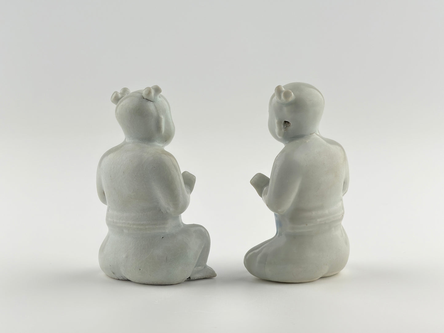 Two Miniature Figurine Of Seated Boys, Circa 1725, Qing Dynasty, Yongzheng Reign