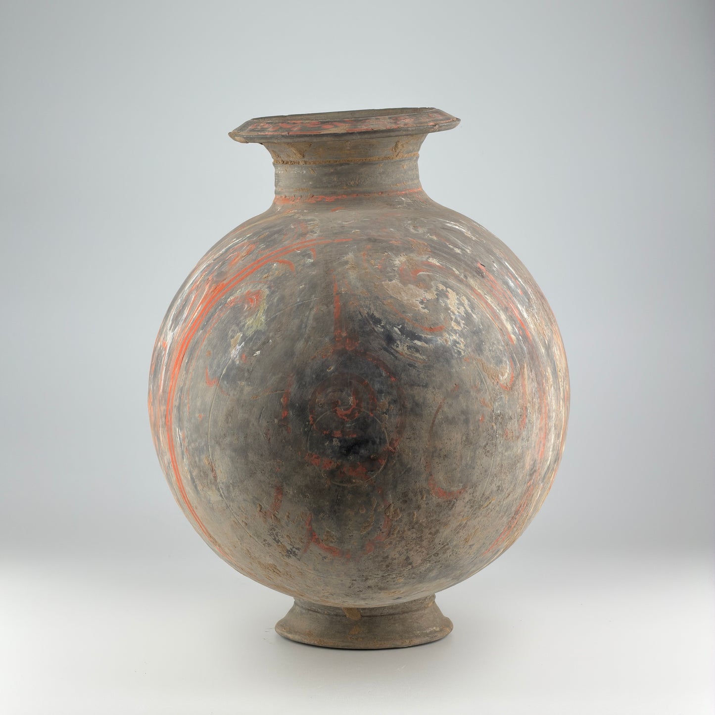 COCOON-SHAPED JAR WITH CLOUD-SCROLL DESIGN, HAN DYNASTY
